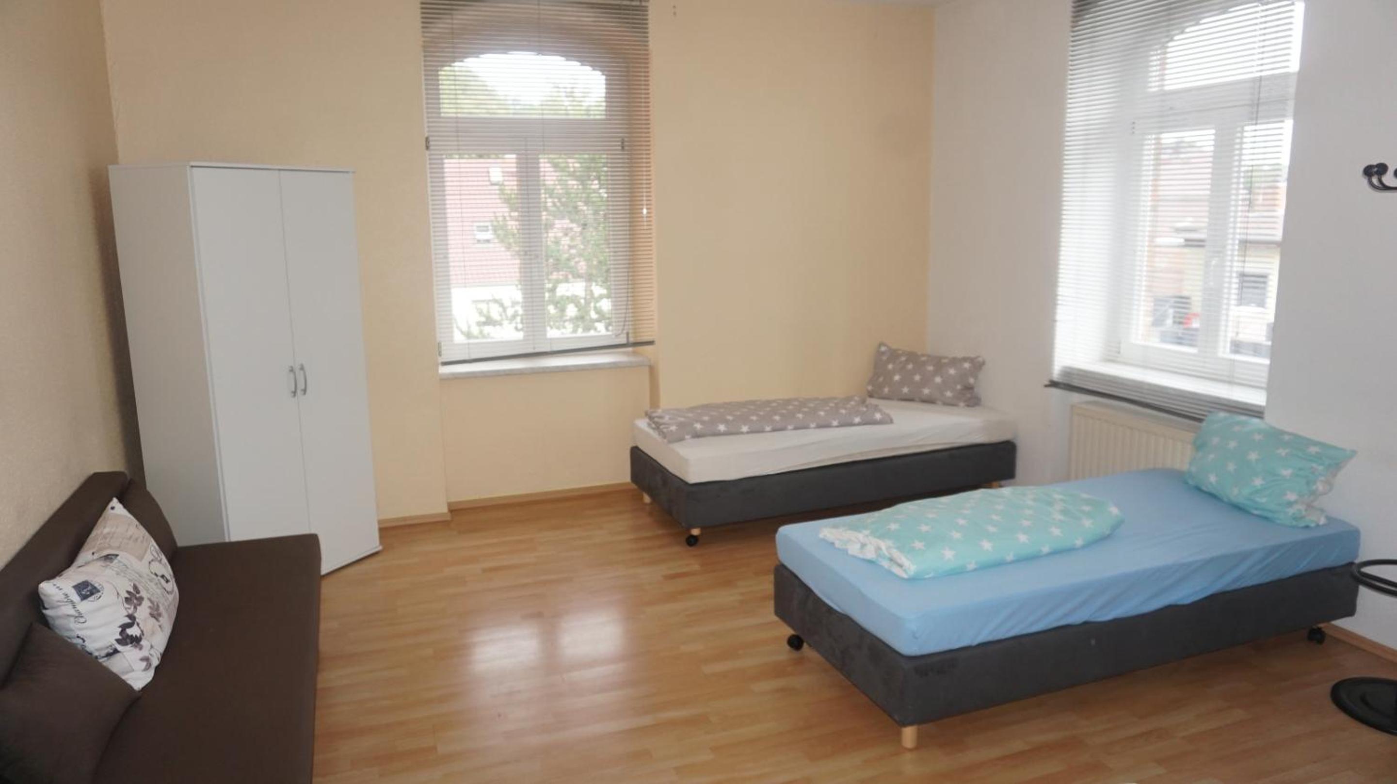 Basic Triple Room with Shared Bathroom photo 2