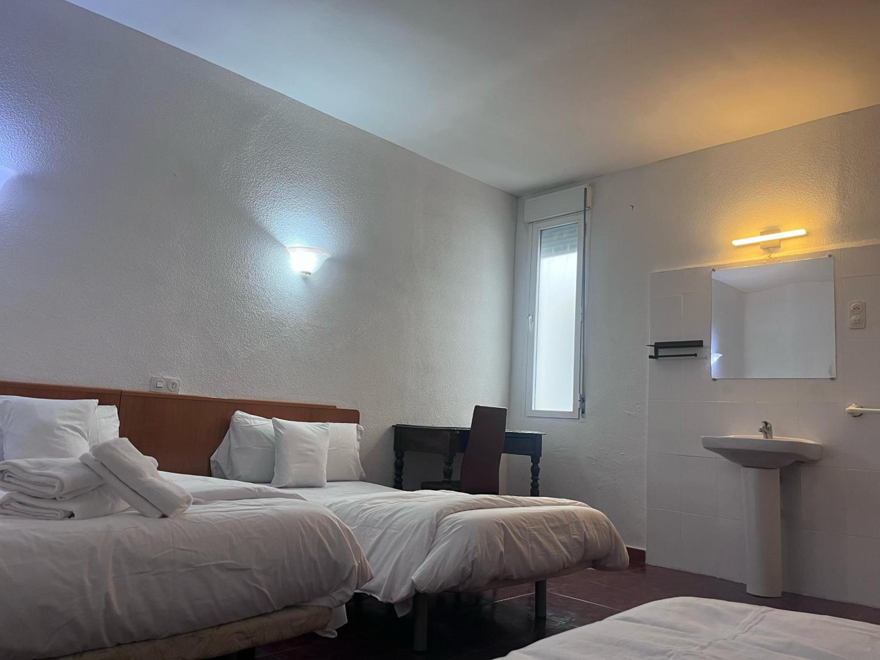 Quadruple Room with Shared Bathroom