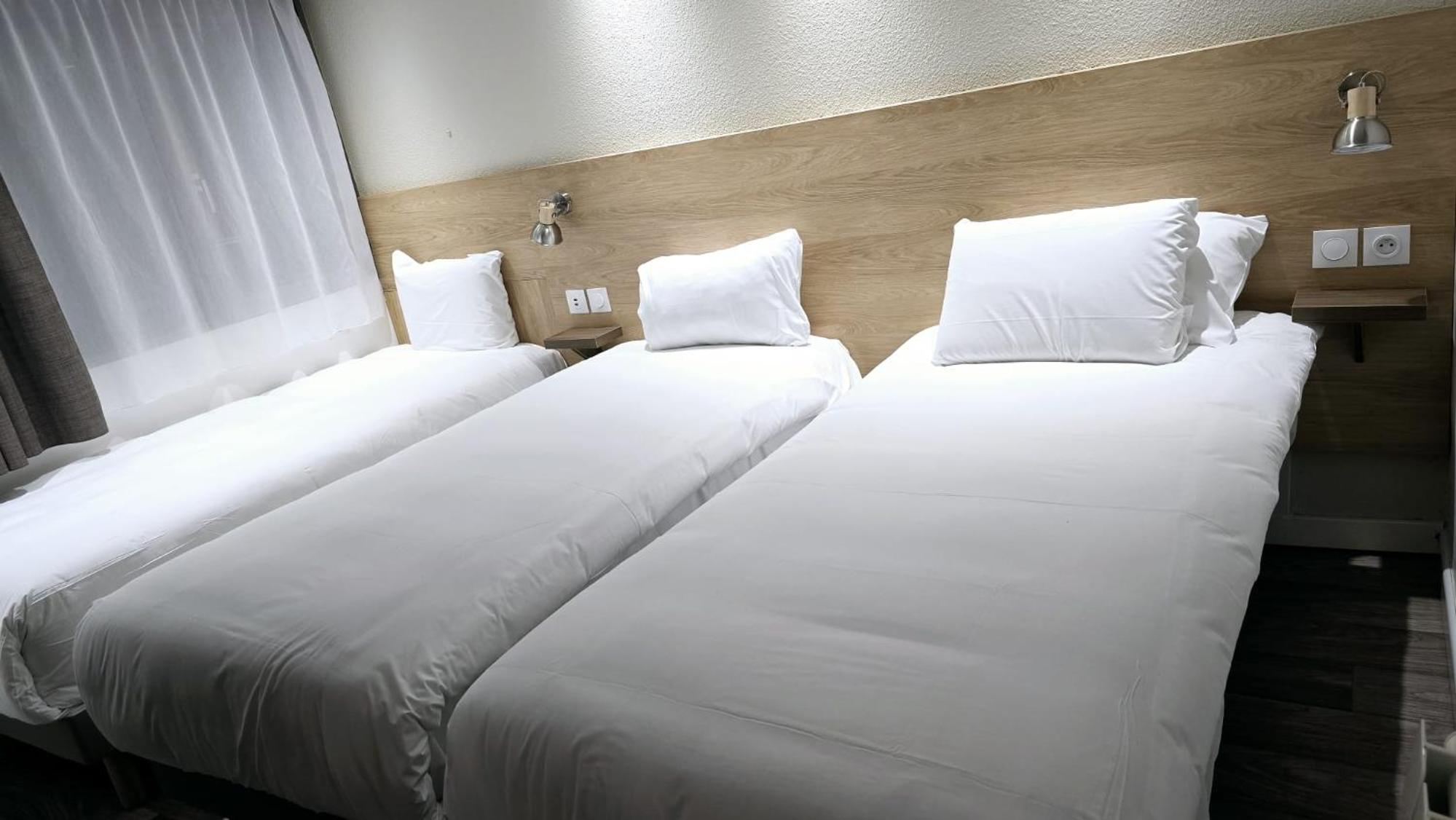 Triple Room - 3 Singe Beds - Photo 4