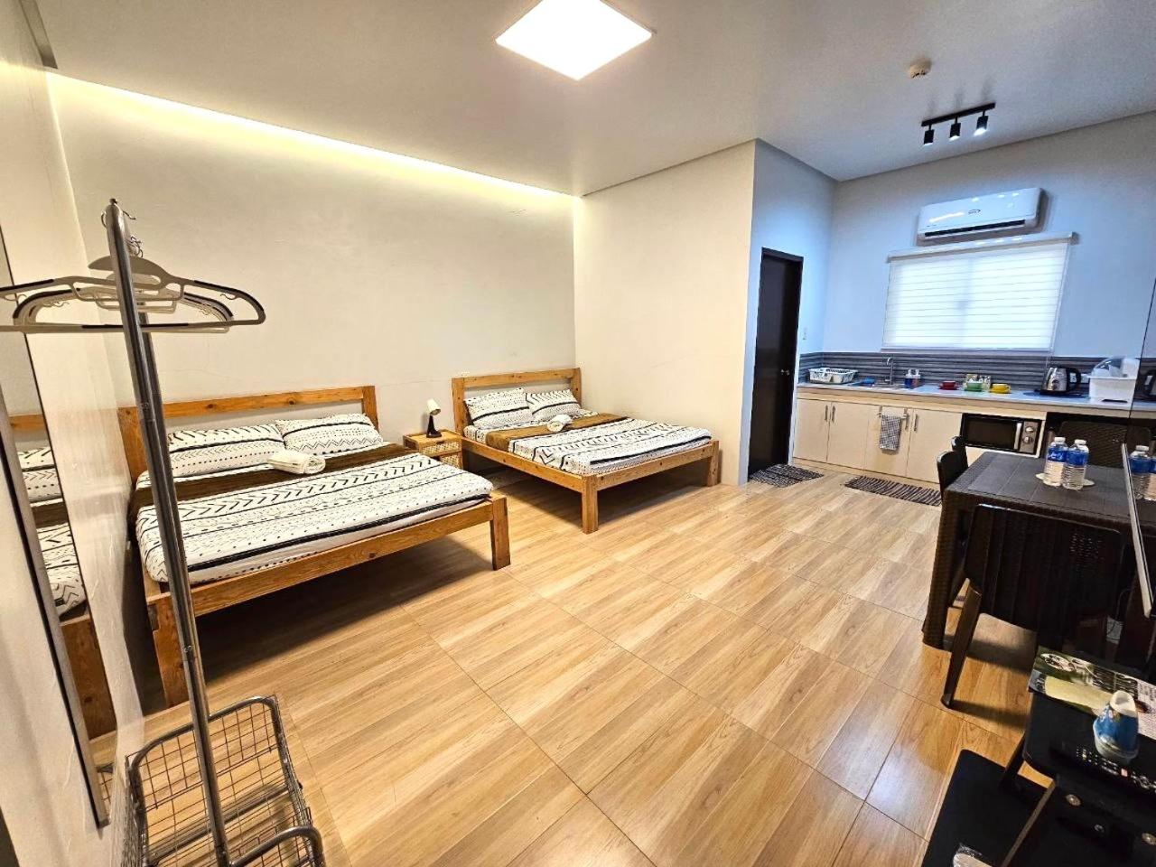 Deluxe Queen Room with Two Queen Beds photo 1