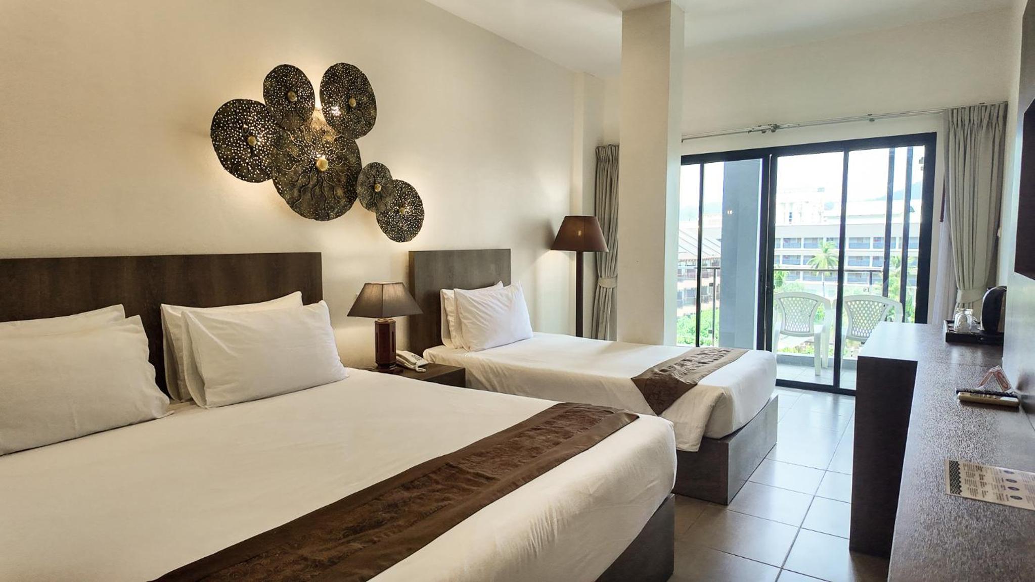 Family Deluxe Balcony Room with One-Time Complimentary Laundry (13 kg)