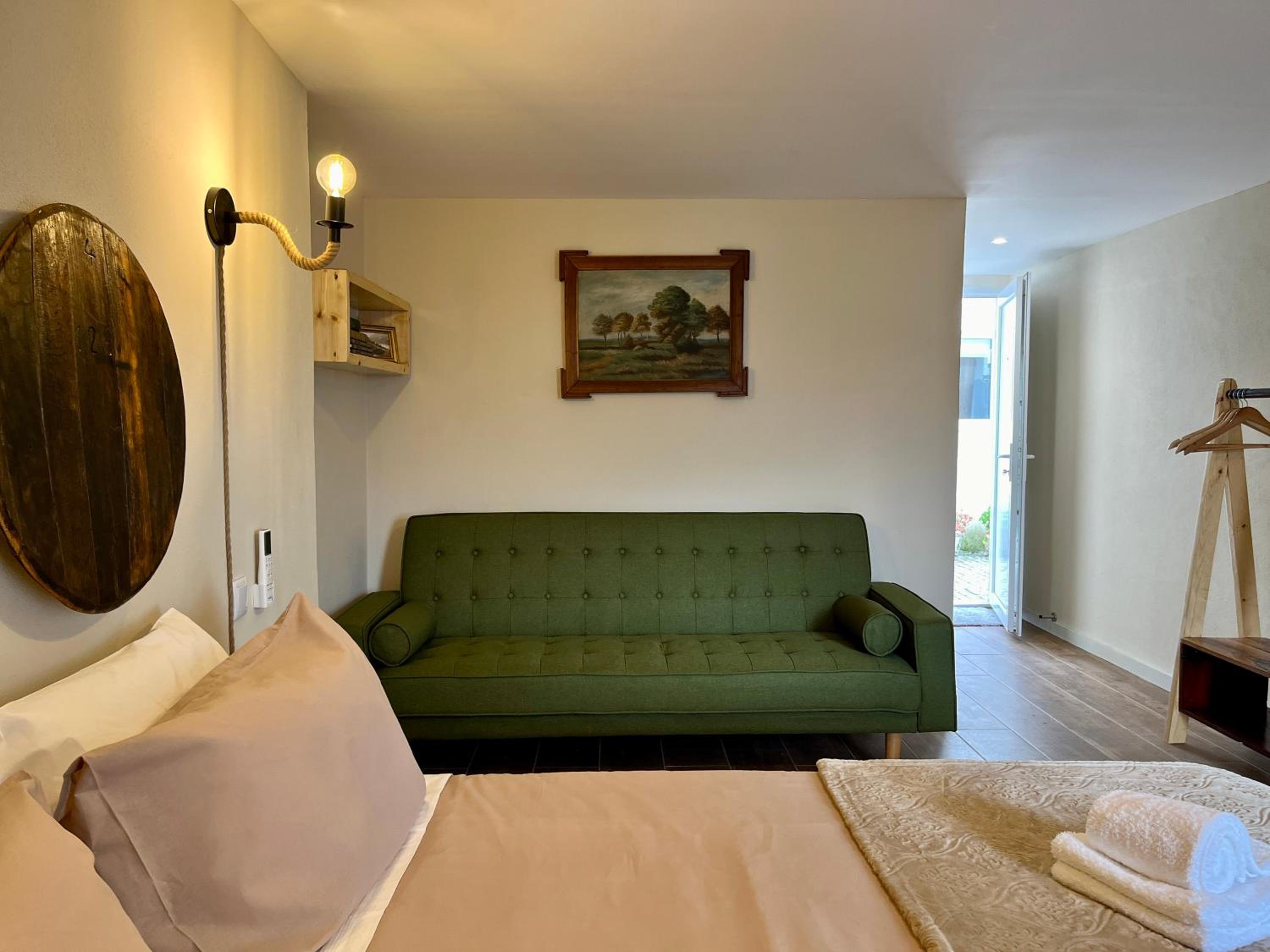 Double Room with Balcony (2 Adults + 1 Child) photo 2