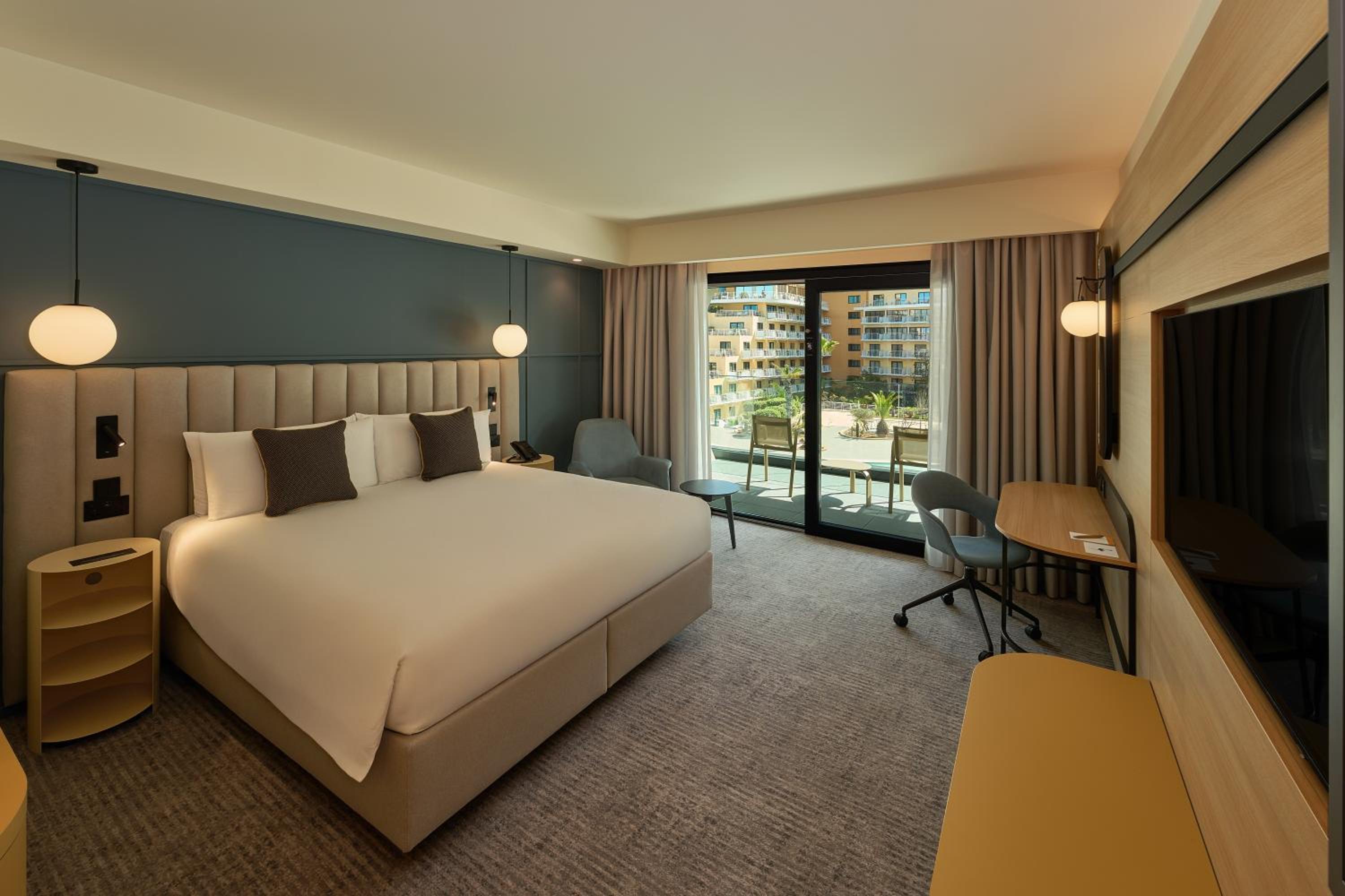 Standard King Room with Balcony and Pool View
