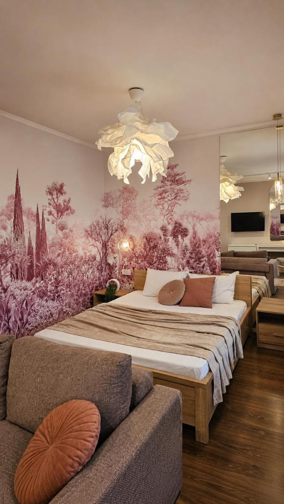 One-Bedroom Apartment with Balcony and City View photo 2
