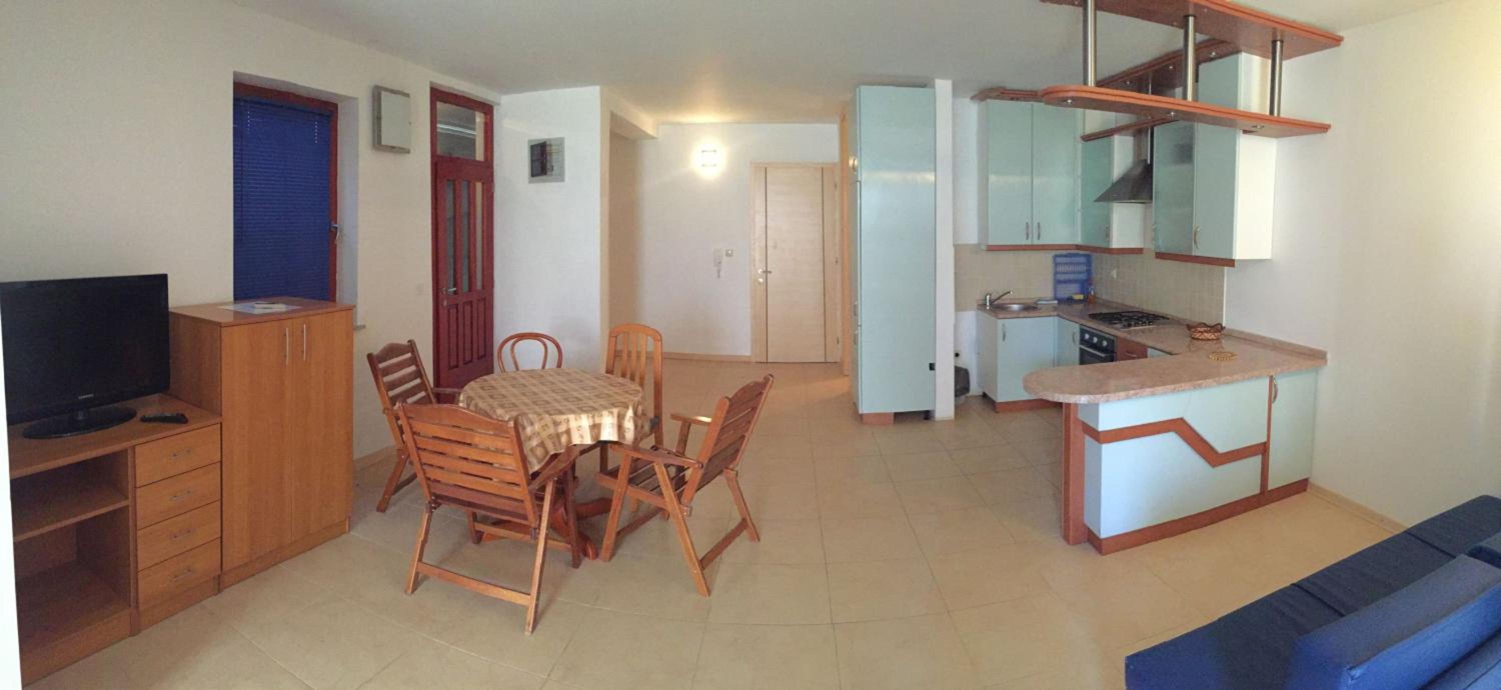 One-Bedroom Apartment with Patio - Photo 7