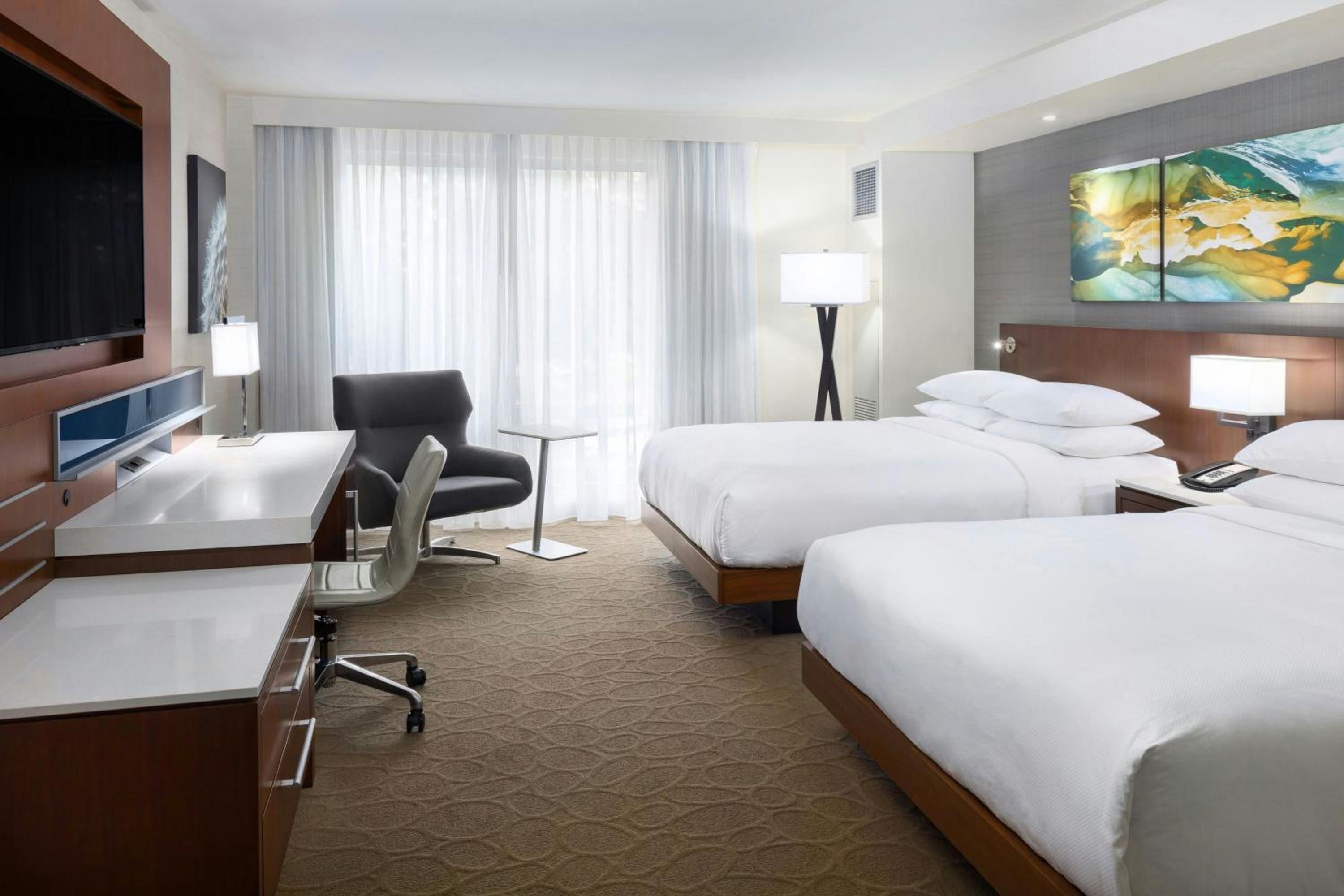Queen Room with Two Queen Beds - Hearing Accessible - Photo 1