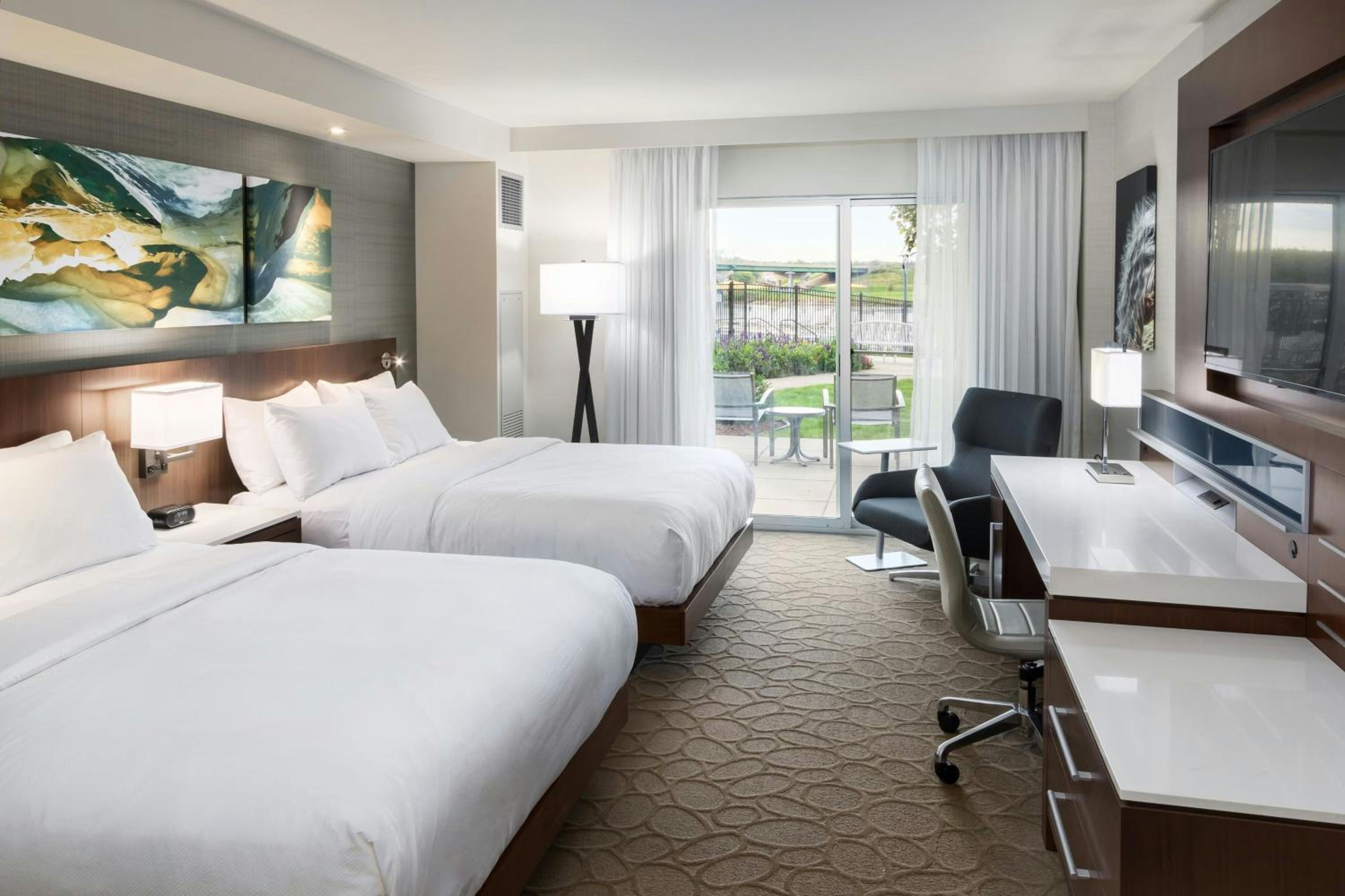 Queen Room with Two Queen Beds and Patio - River View - Hearing Accessible photo 1