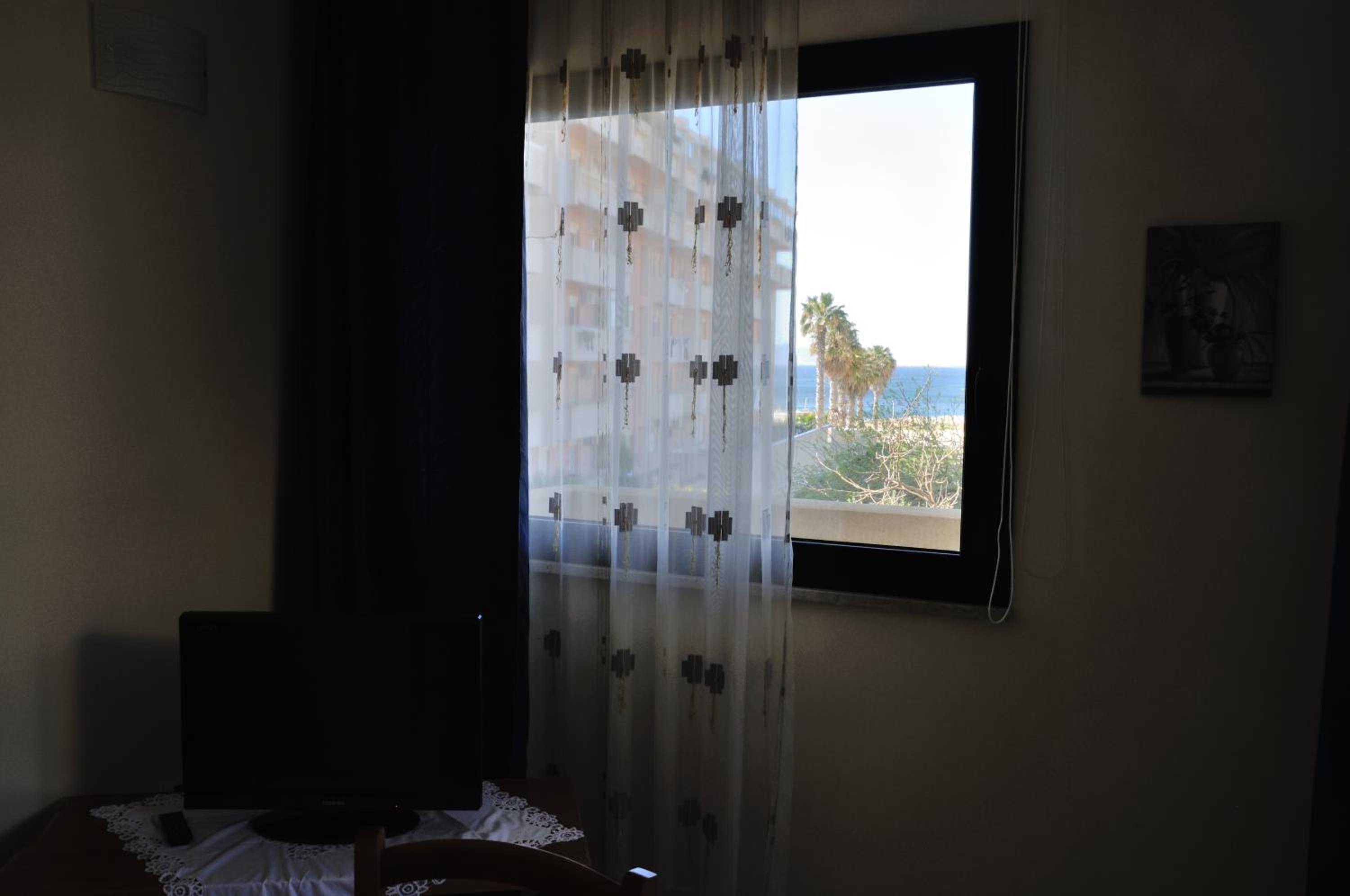 Two-Bedroom Apartment (3 Adults) - Photo 9