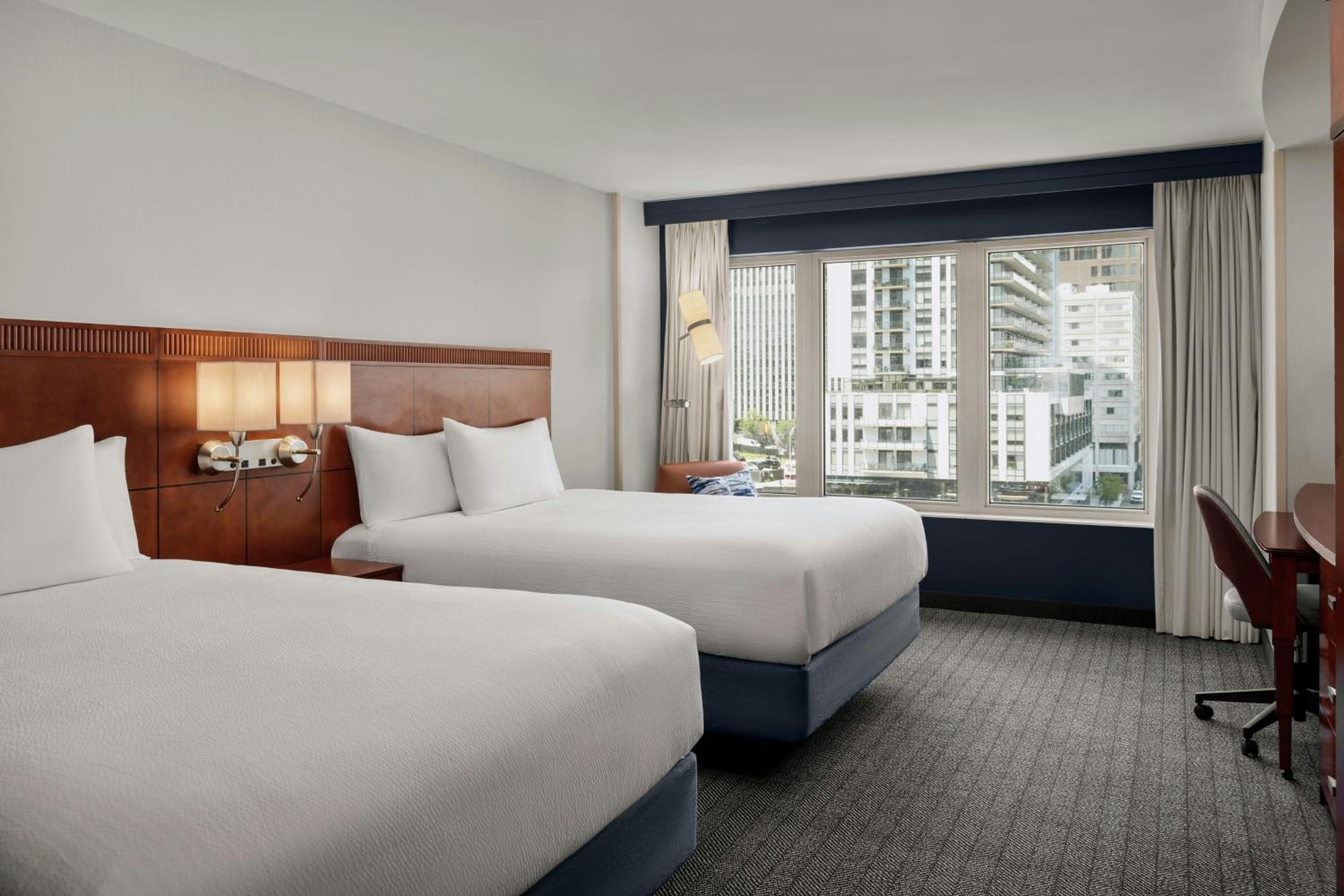 Queen Room with Two Queen Beds and Bathtub - Mobility Access/Hearing Accessible - Photo 1