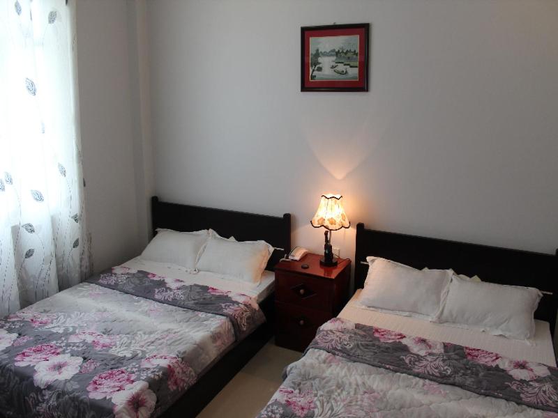 Deluxe Queen Room with Two Queen Beds photo 1