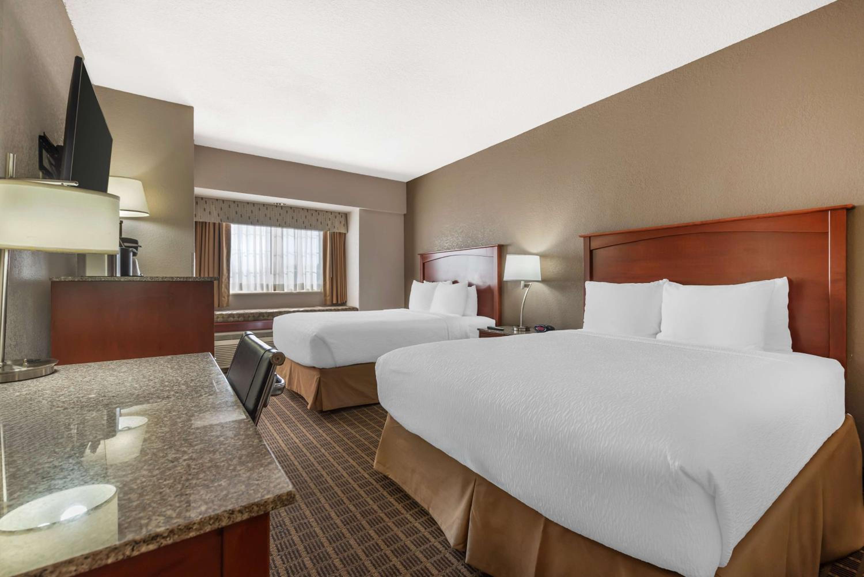 Queen Room with Two Queen Beds - Pet-friendly - Photo 1
