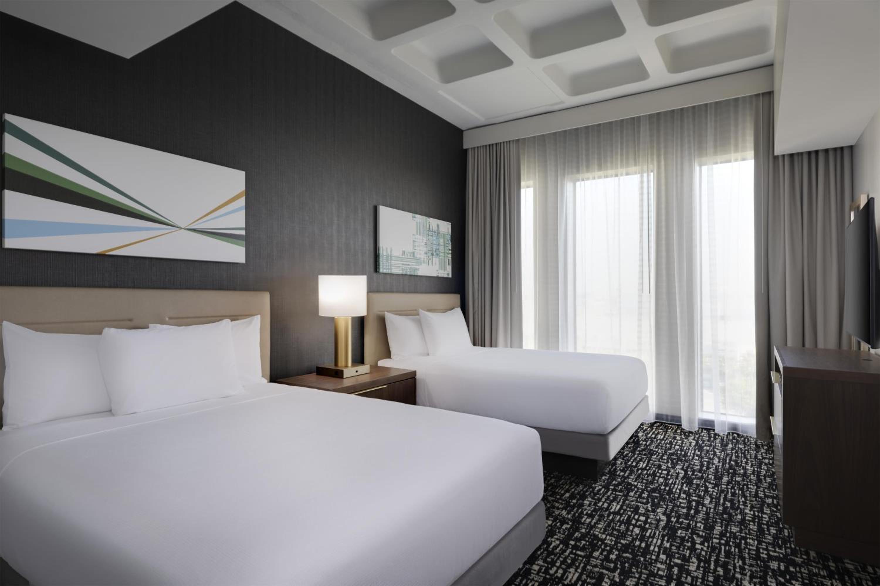 Accessible One Bedroom Kitchen Suite/Tub | Two Queen Beds (Plus Sofa Bed)