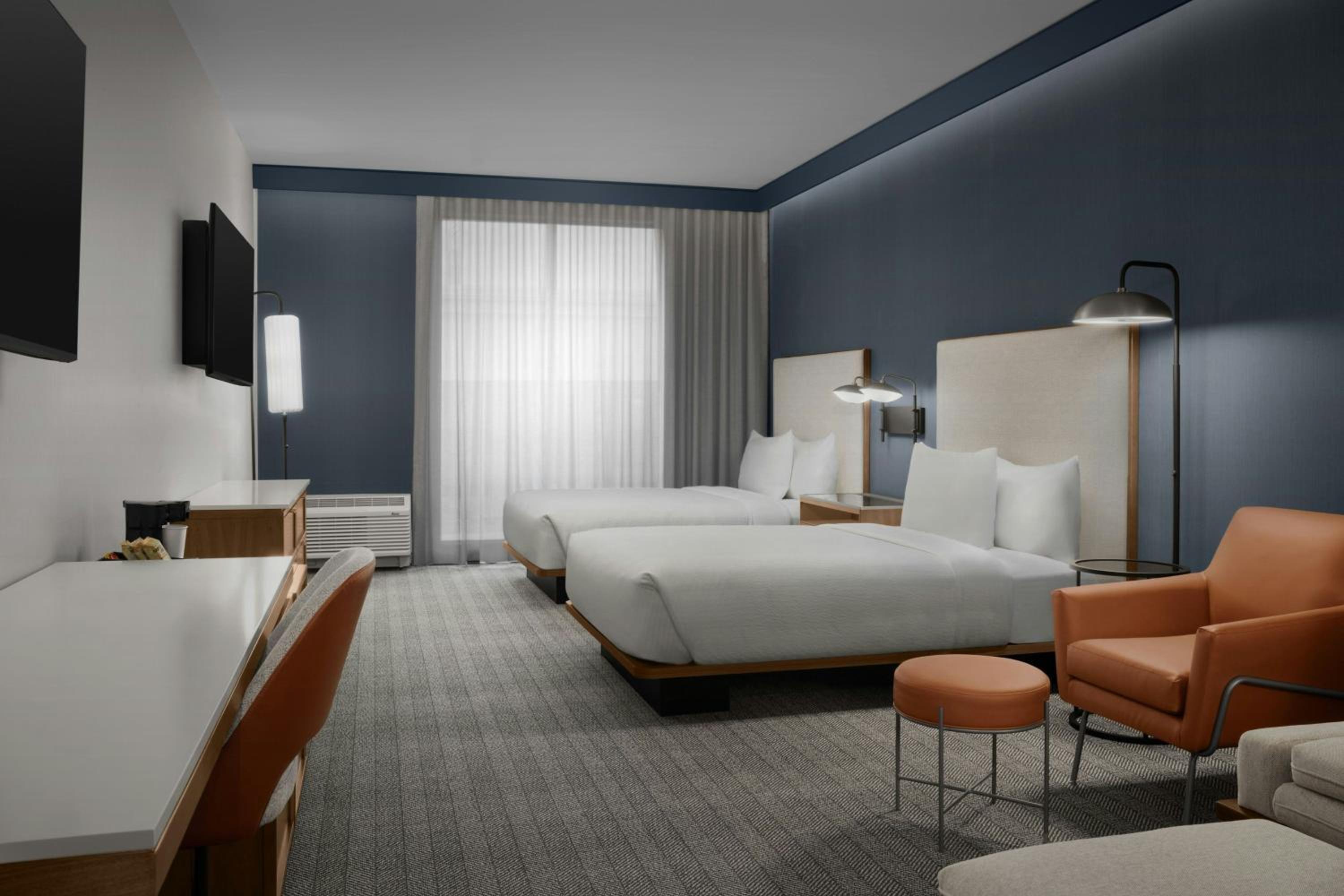 Queen Room with Two Queen Beds and Sofa Bed photo 3