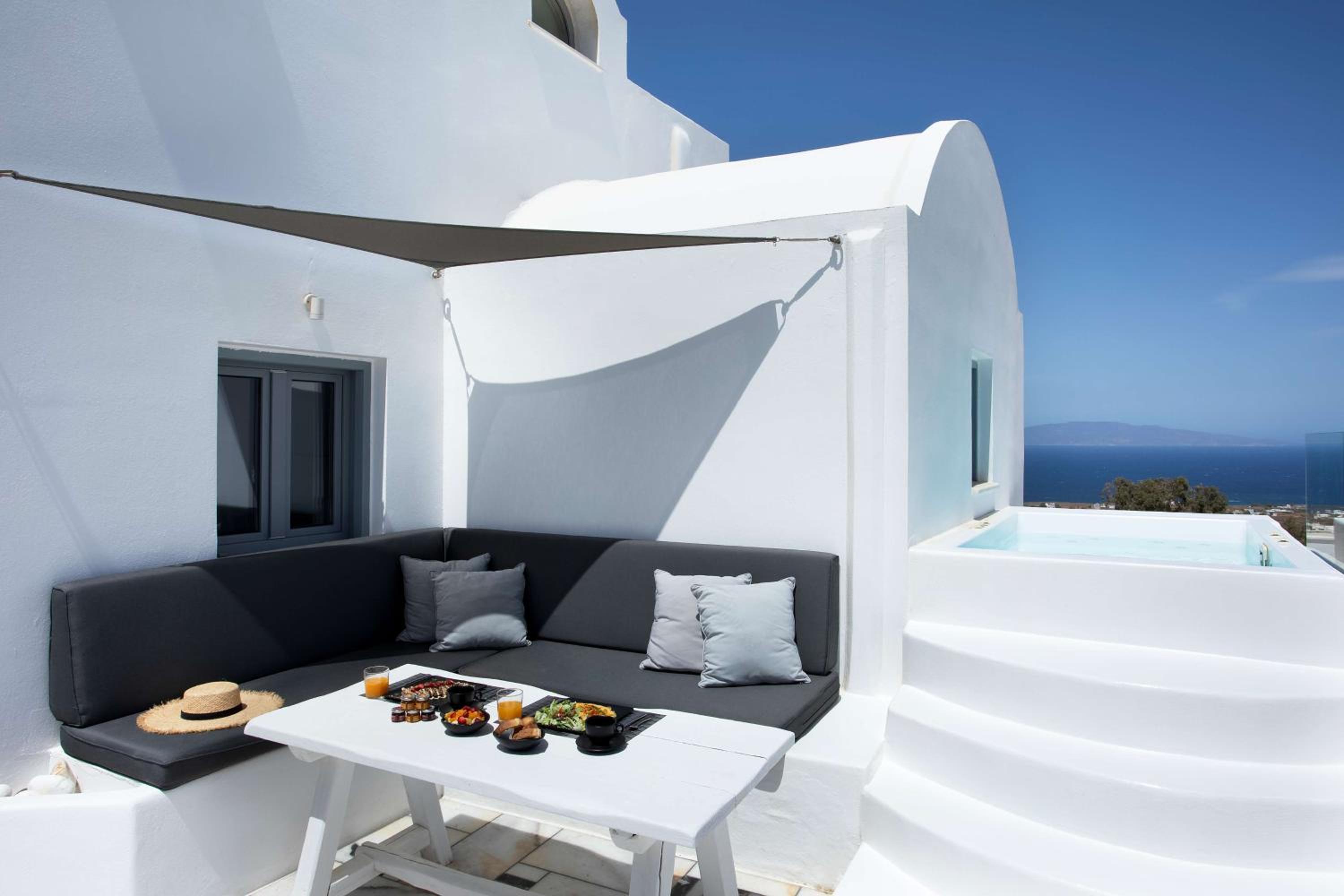 The ArmonOia Cycladic Villa with Outdoor Hot Tub and Caldera View