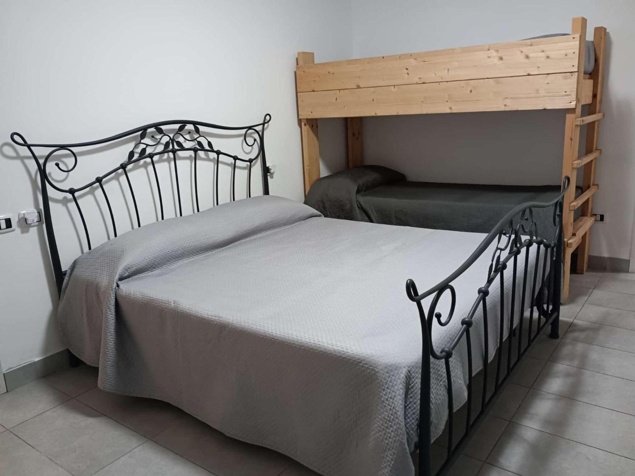 Quadruple Room with Private Bathroom - Photo 1