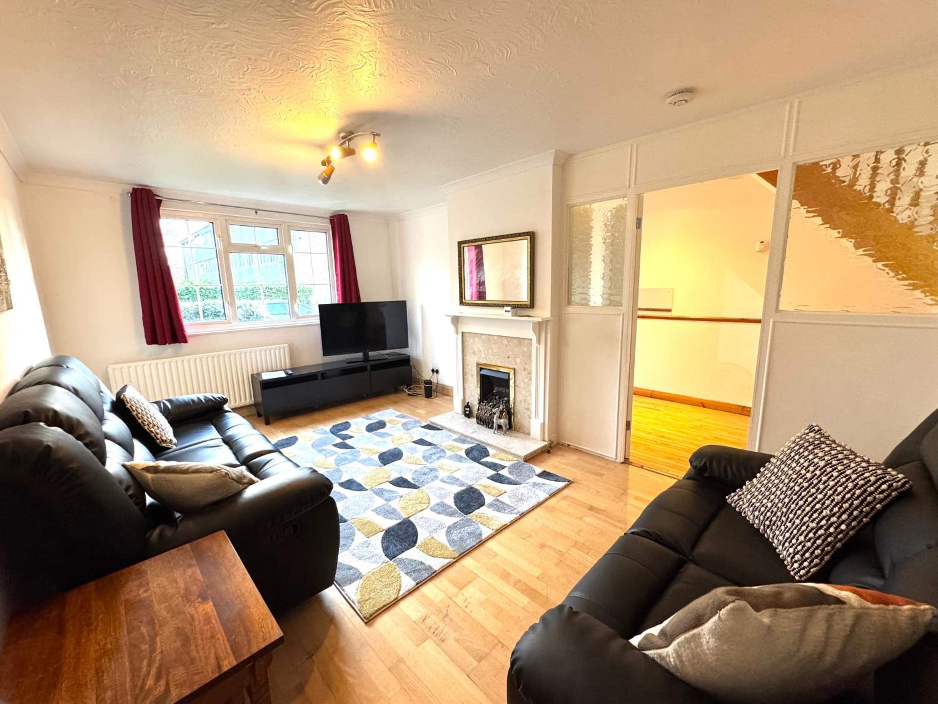Three-Bedroom Apartment photo 1