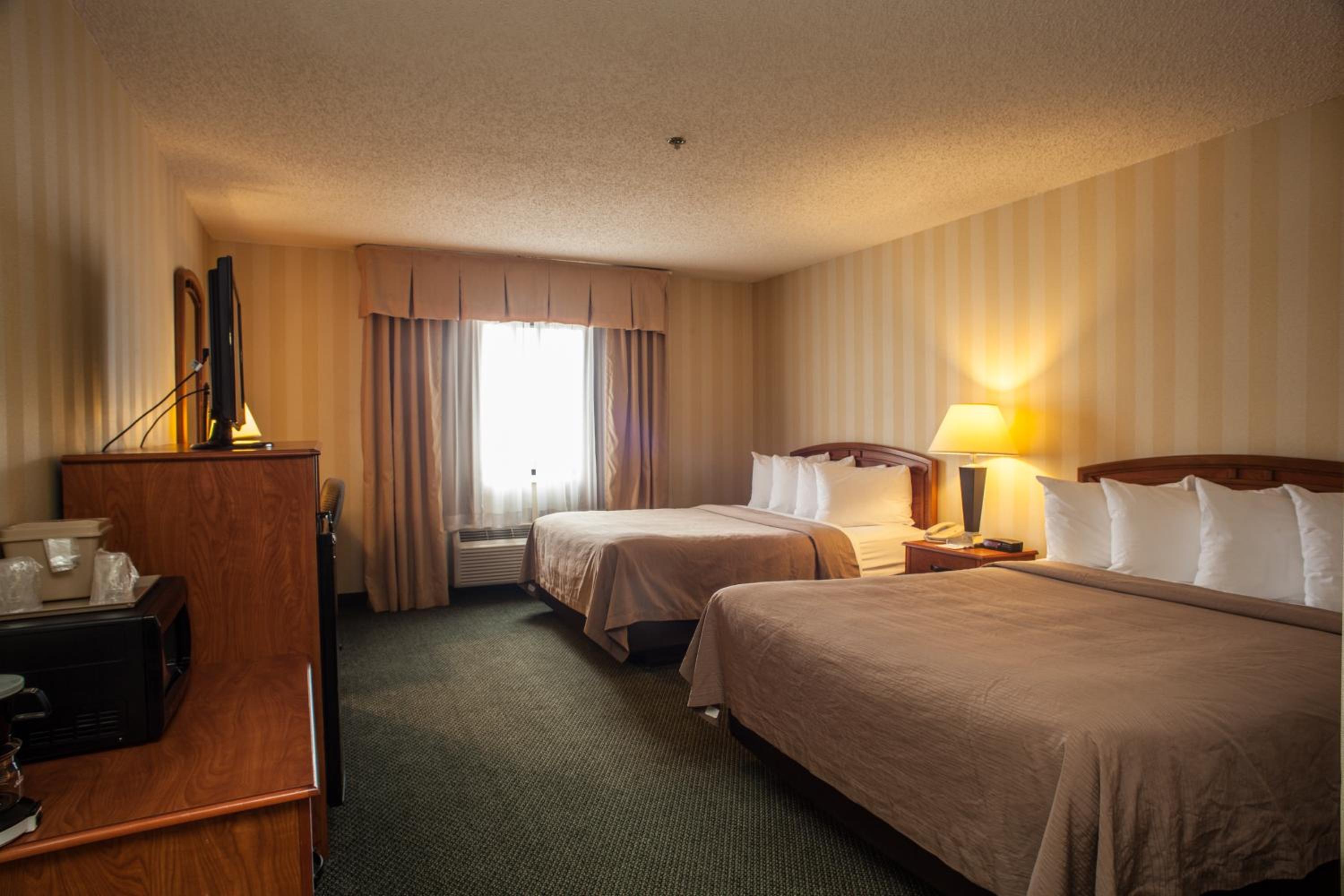 Queen Room with Two Queen Beds - Non-Smoking - Photo 1