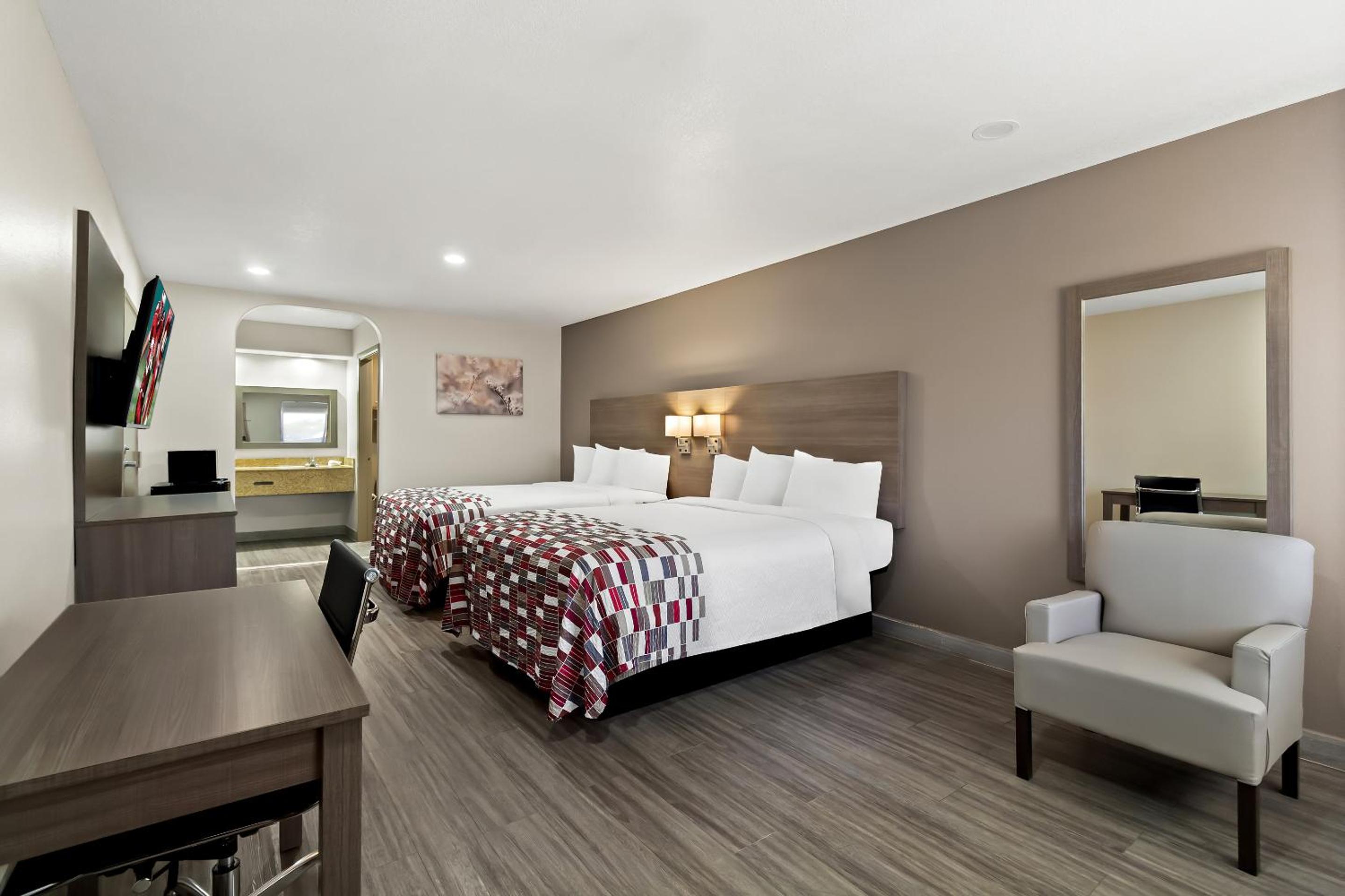 Deluxe Queen Room with Two Queen Beds Non-Smoking - Photo 1