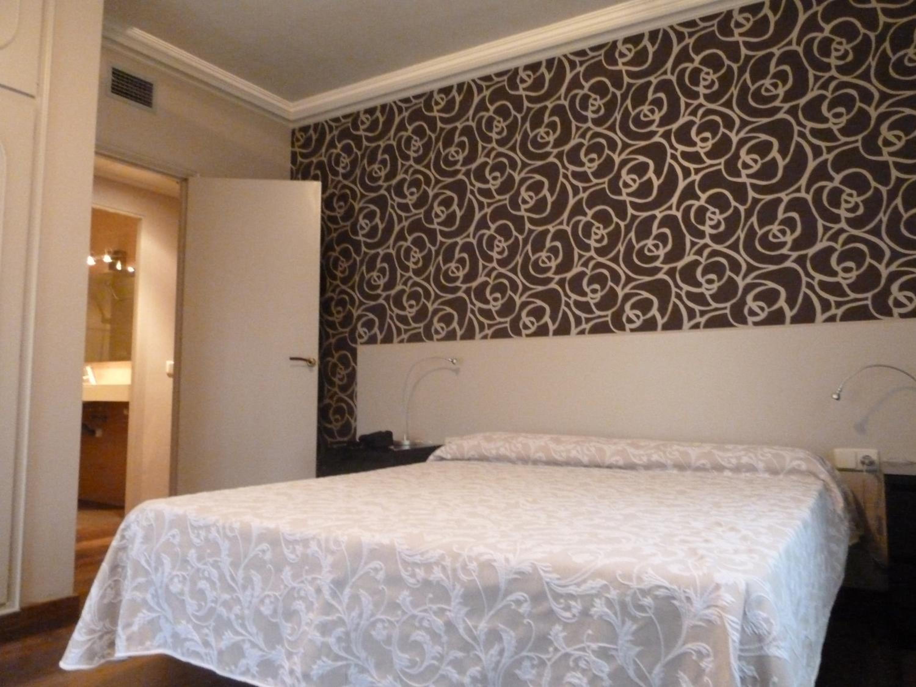 Habitación familiar (2 adultos + 1 niño)