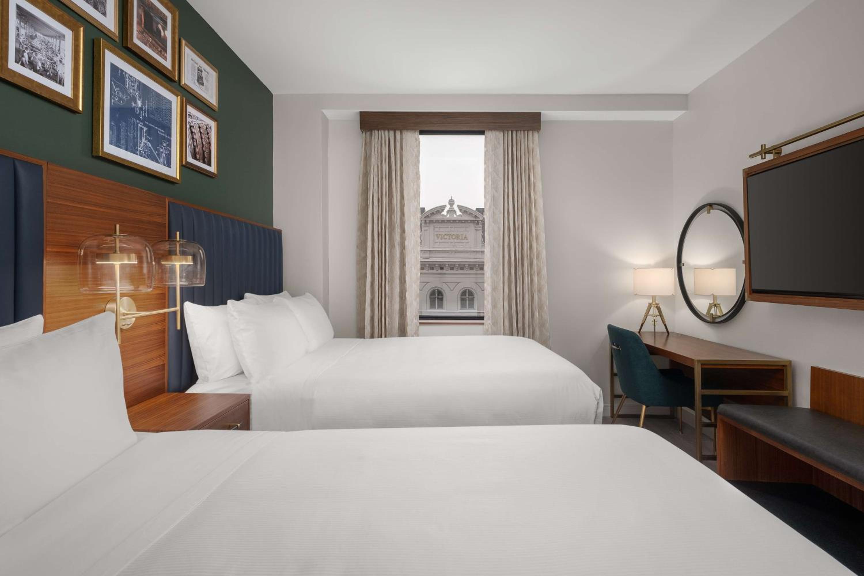 Queen Room with Two Queen Beds and Theater View - Photo 1