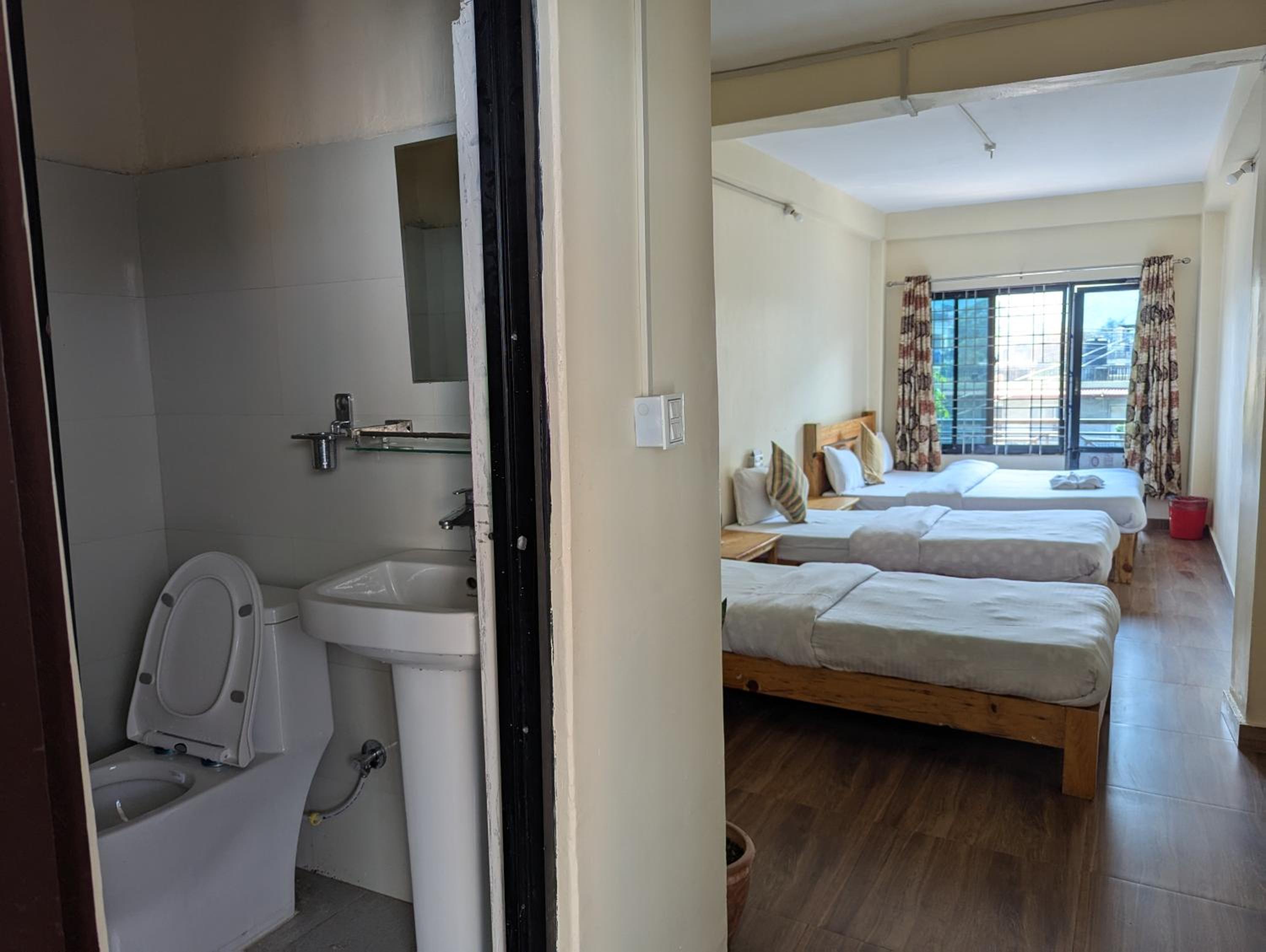 Quadruple Room with Private Bathroom