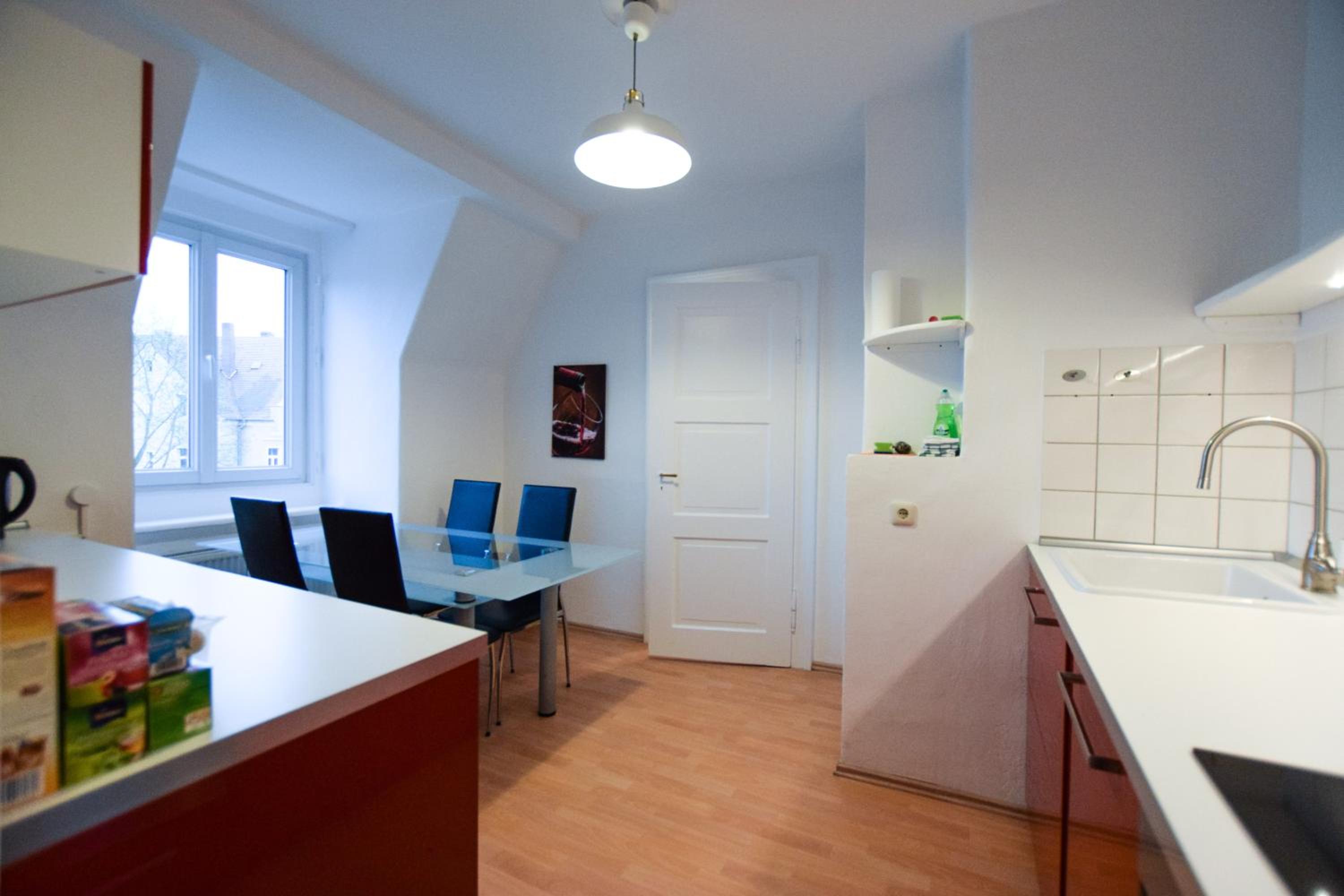 Three-Bedroom Apartment - Photo 2