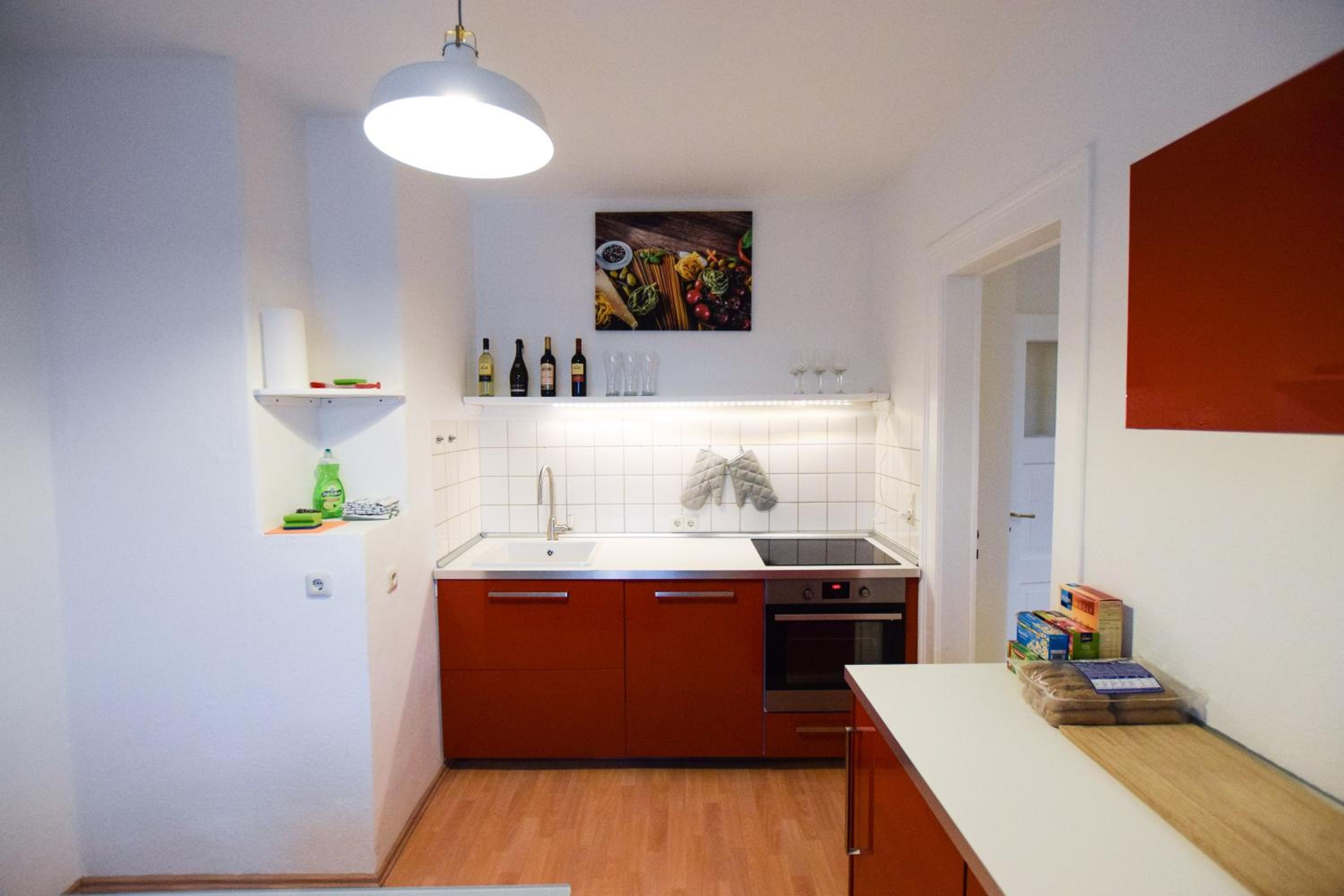 Three-Bedroom Apartment - Photo 12