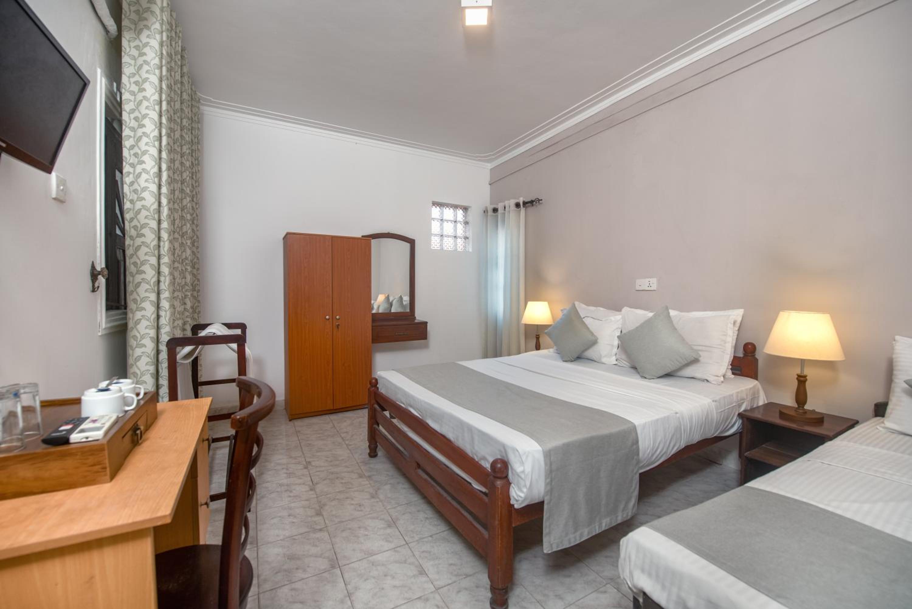 Standard Triple Room - Photo 7