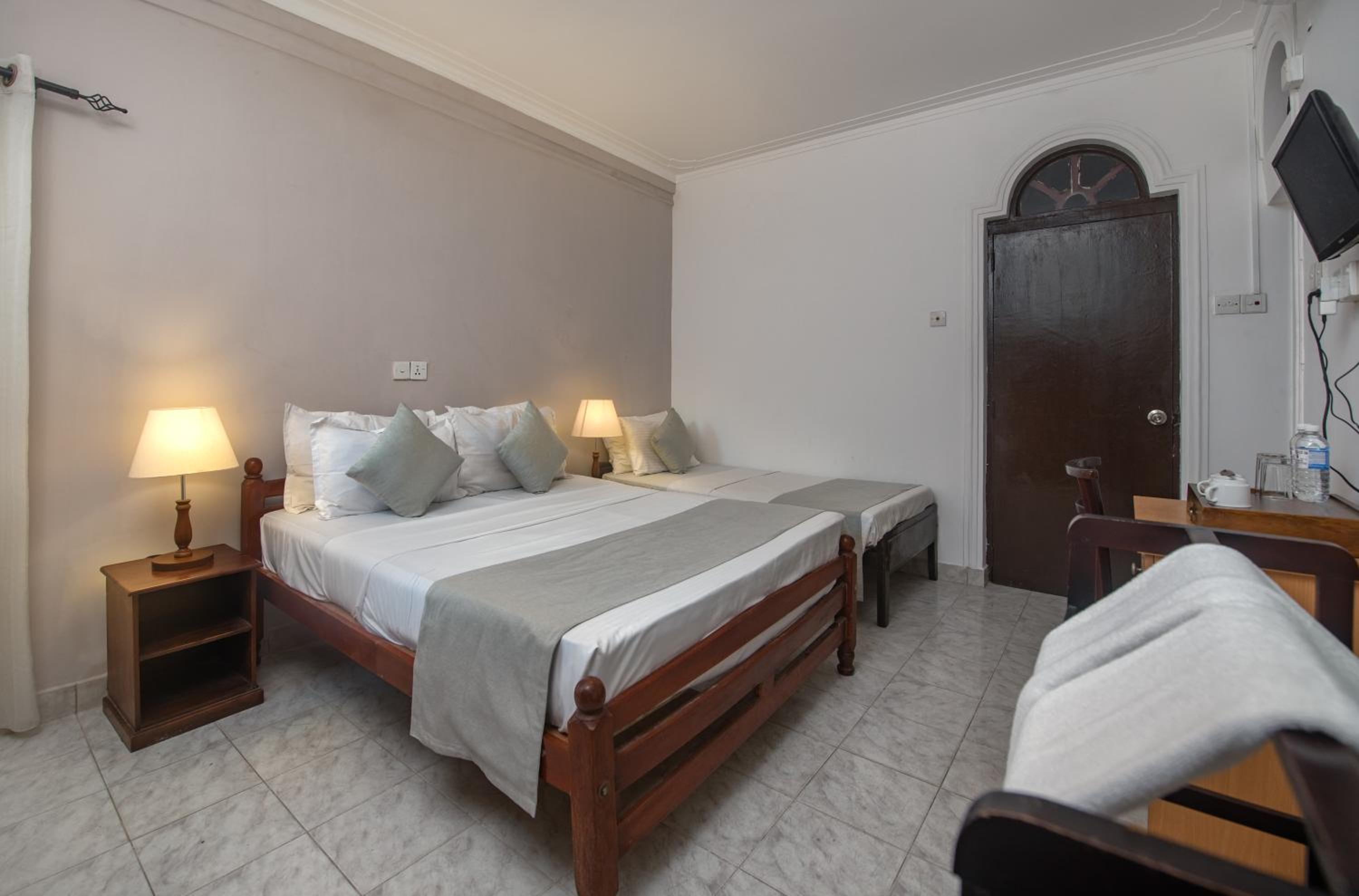 Standard Triple Room - Photo 8