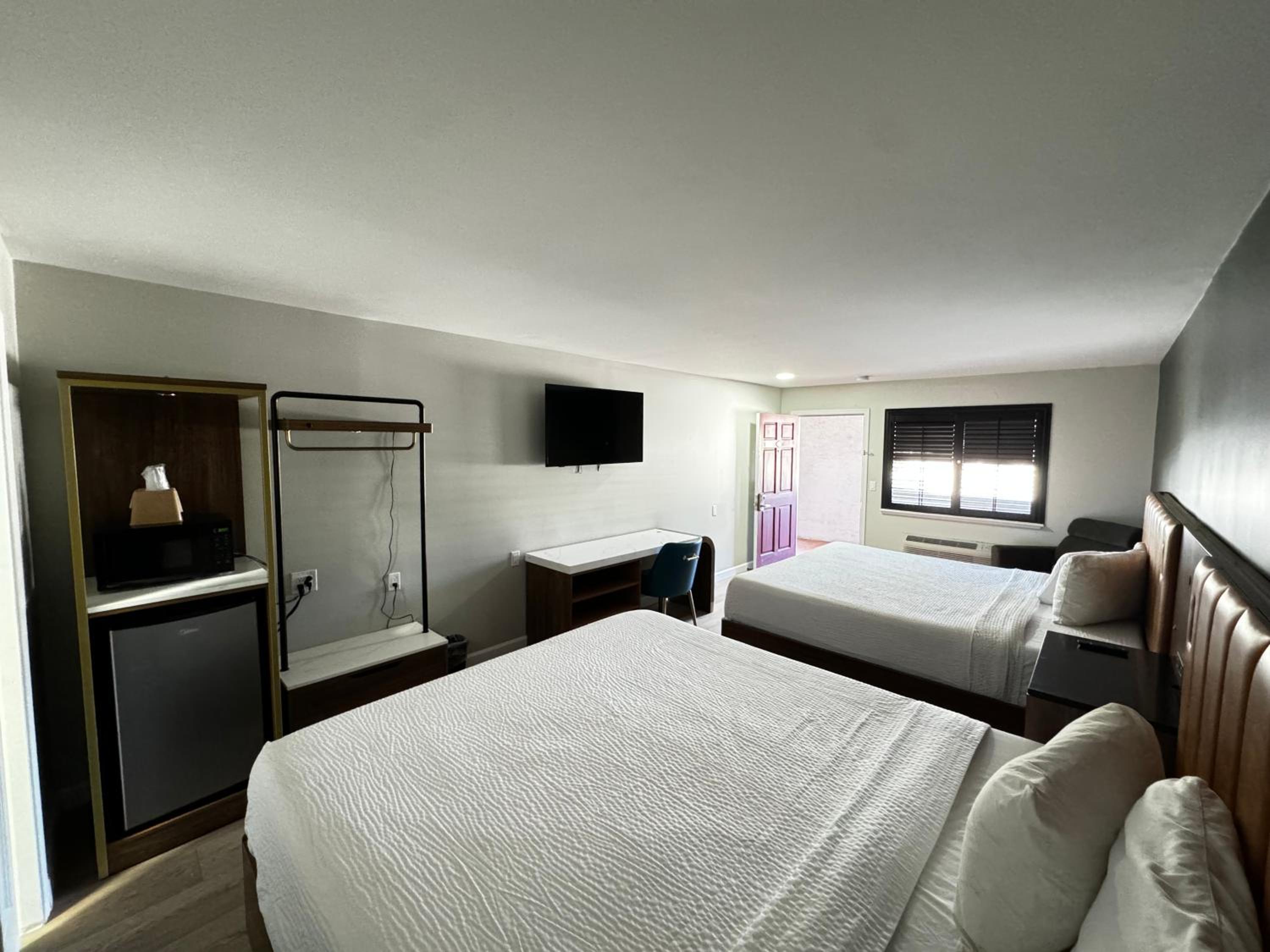 King Room with Two King Beds and Shower - Non-Smoking