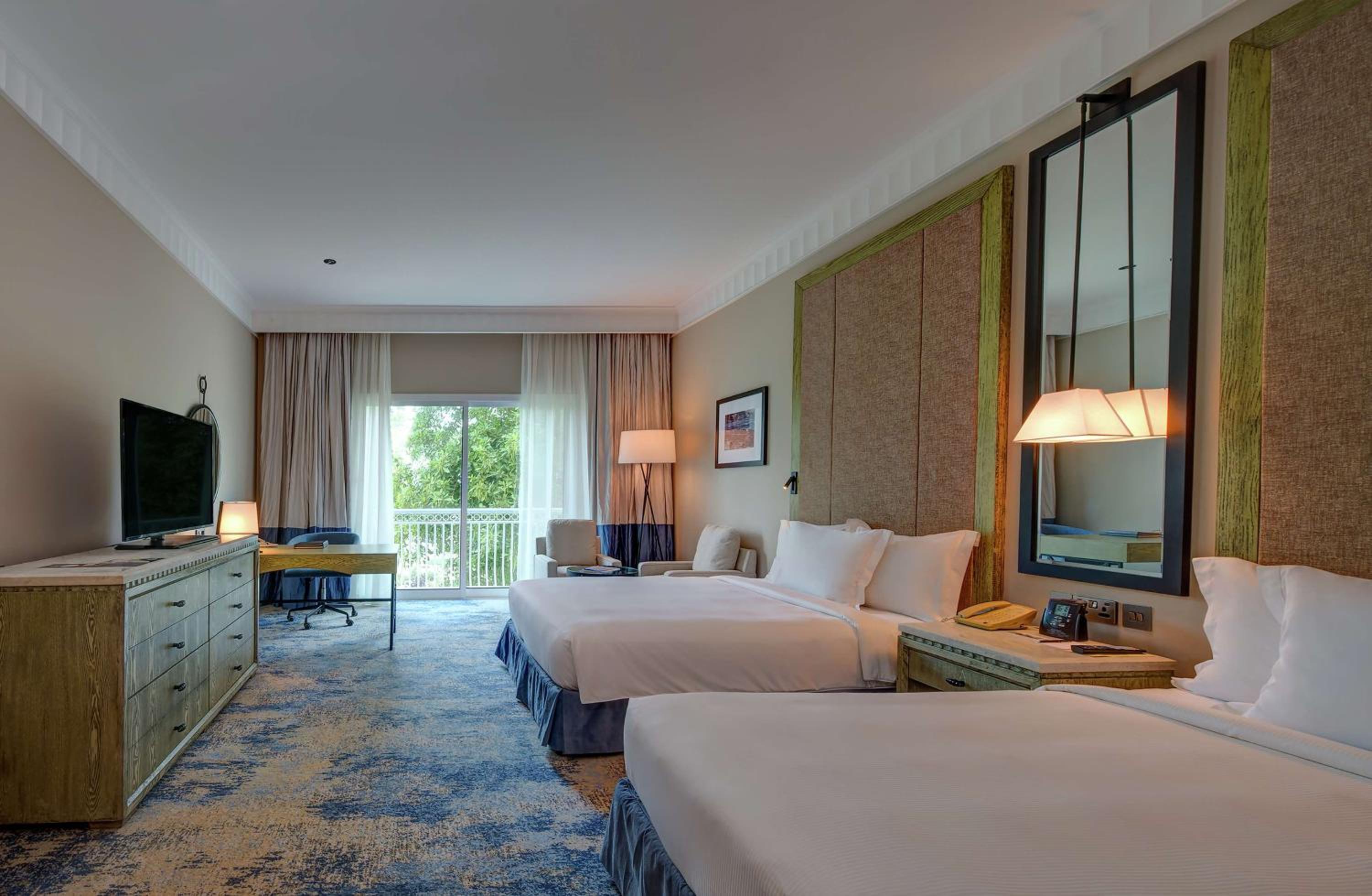 Family Queen Room with Two Queen Beds - Photo 1