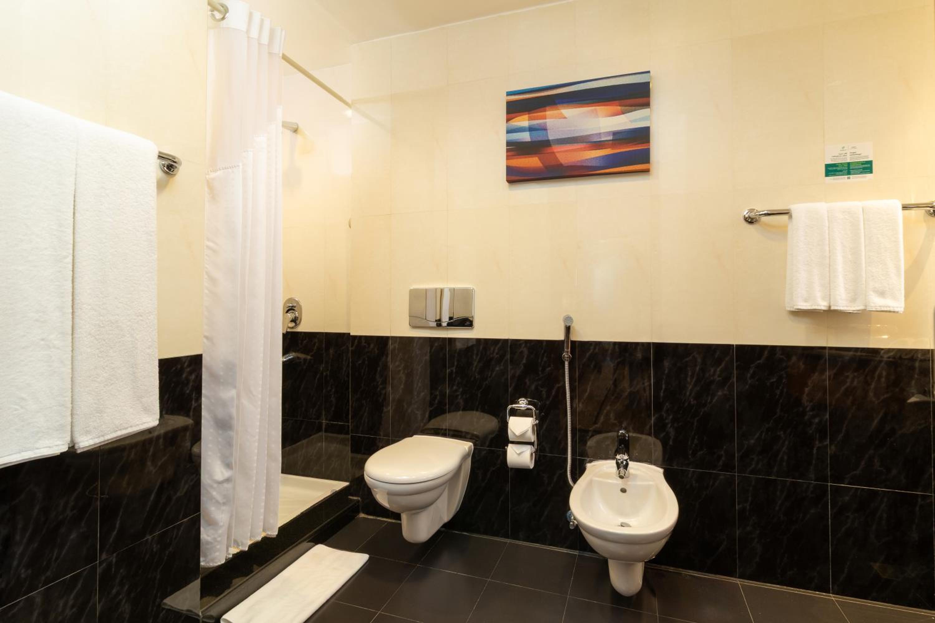 Two-Bedroom Suite with One King Bed, One Queen Bed and Sea View - Lounge Access