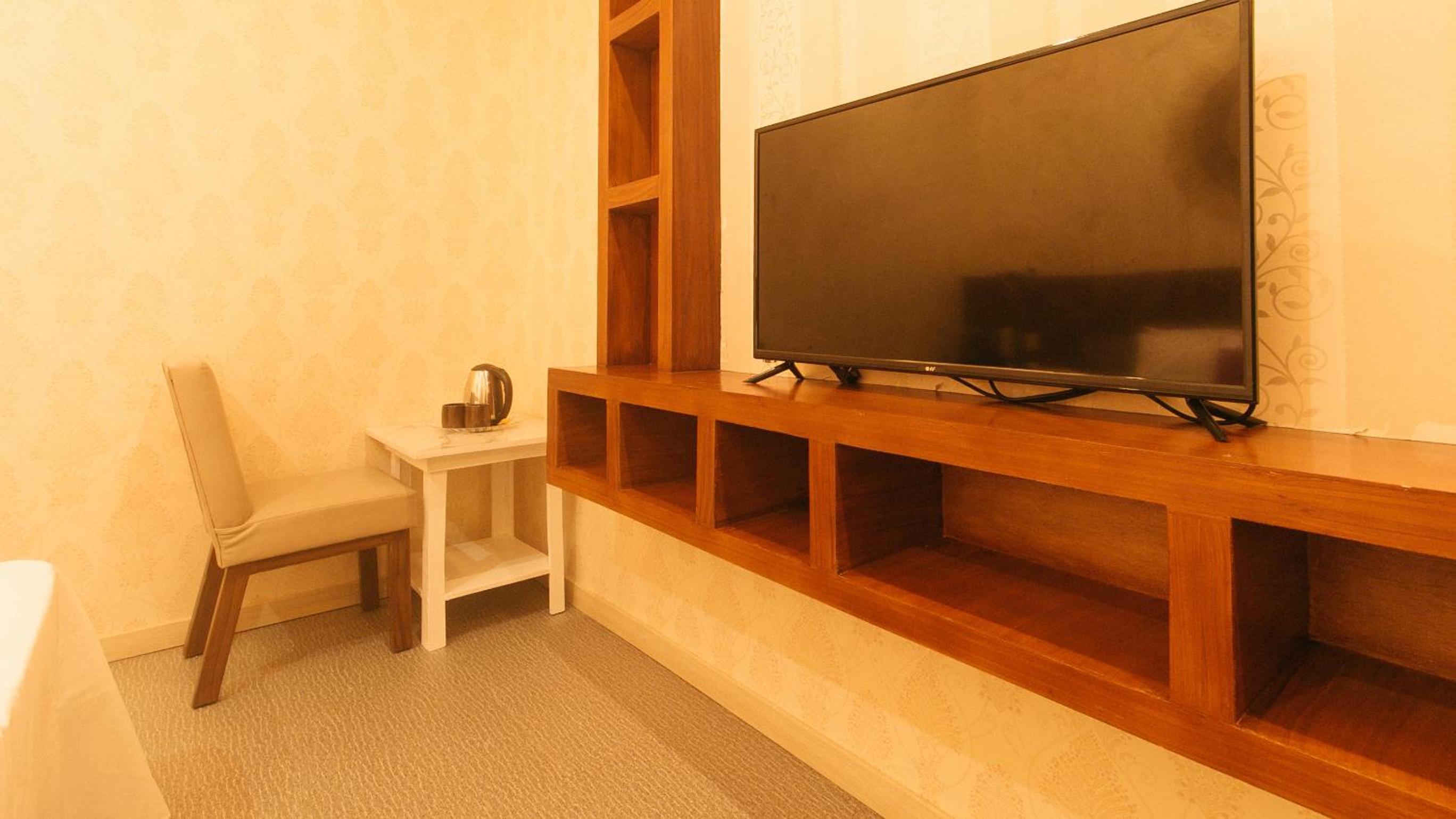 Deluxe Room - Photo 11