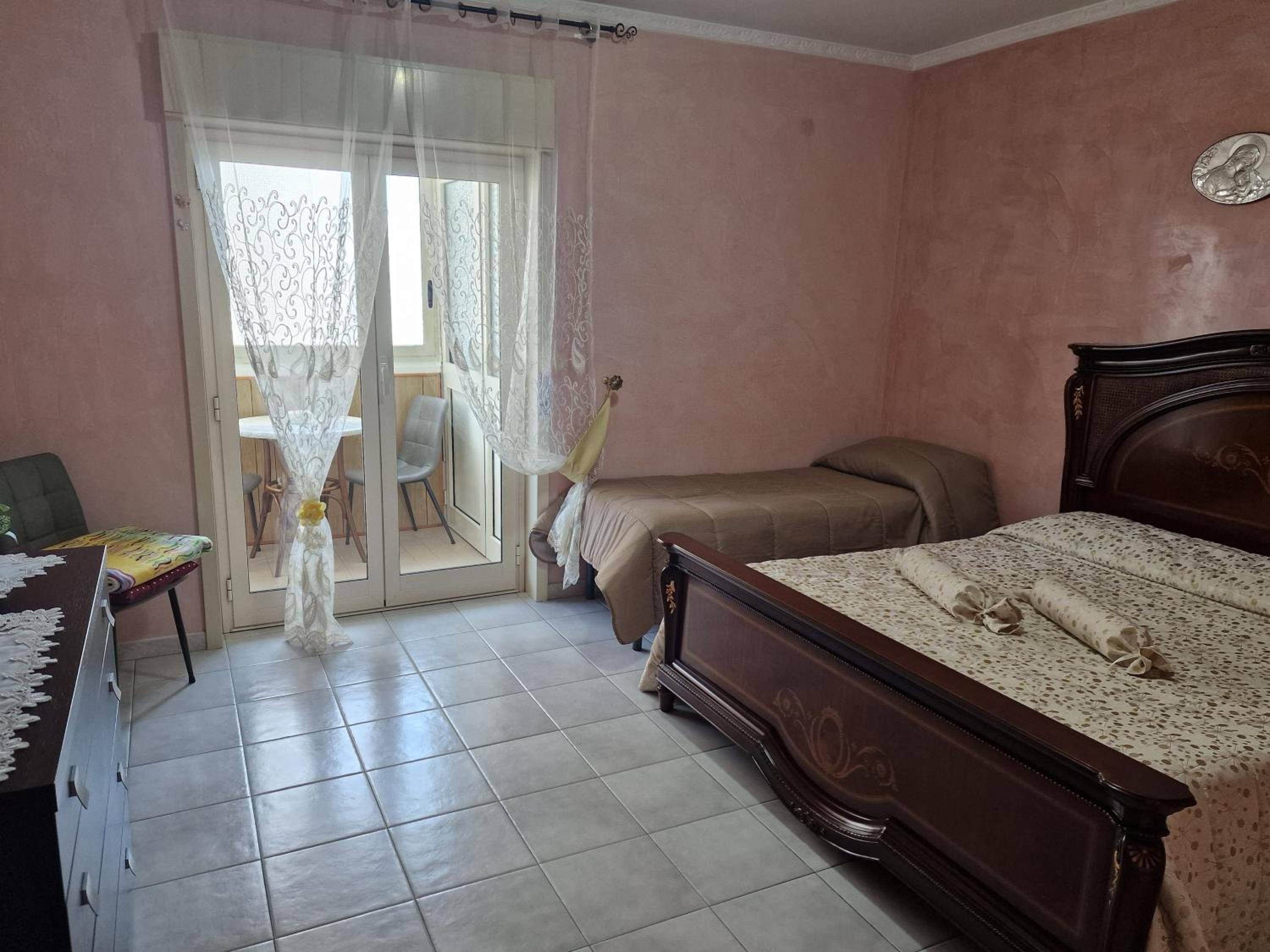 Quadruple Room with Balcony