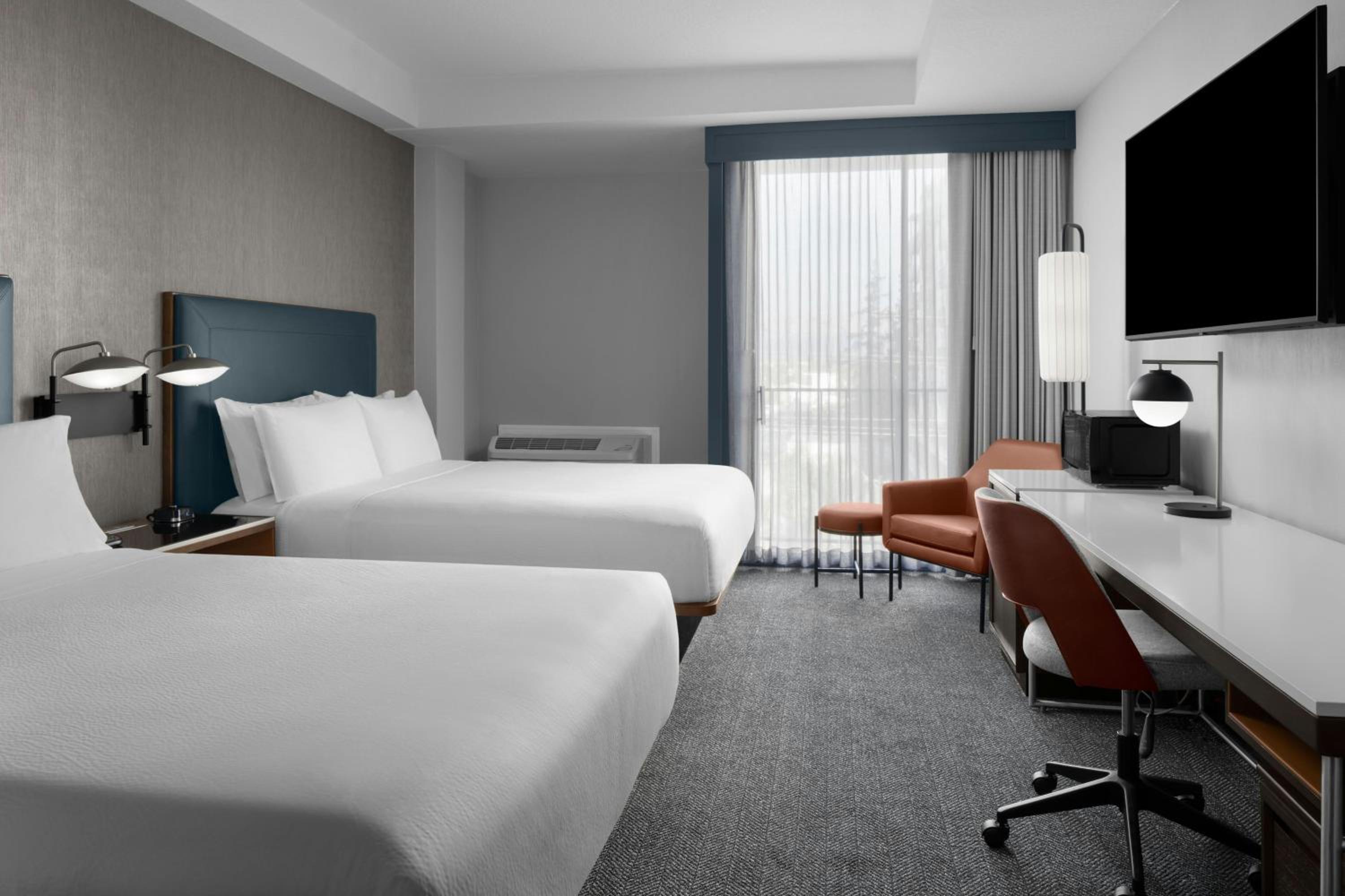 Queen Room with Two Queen Beds - Hearing Accessible photo 1