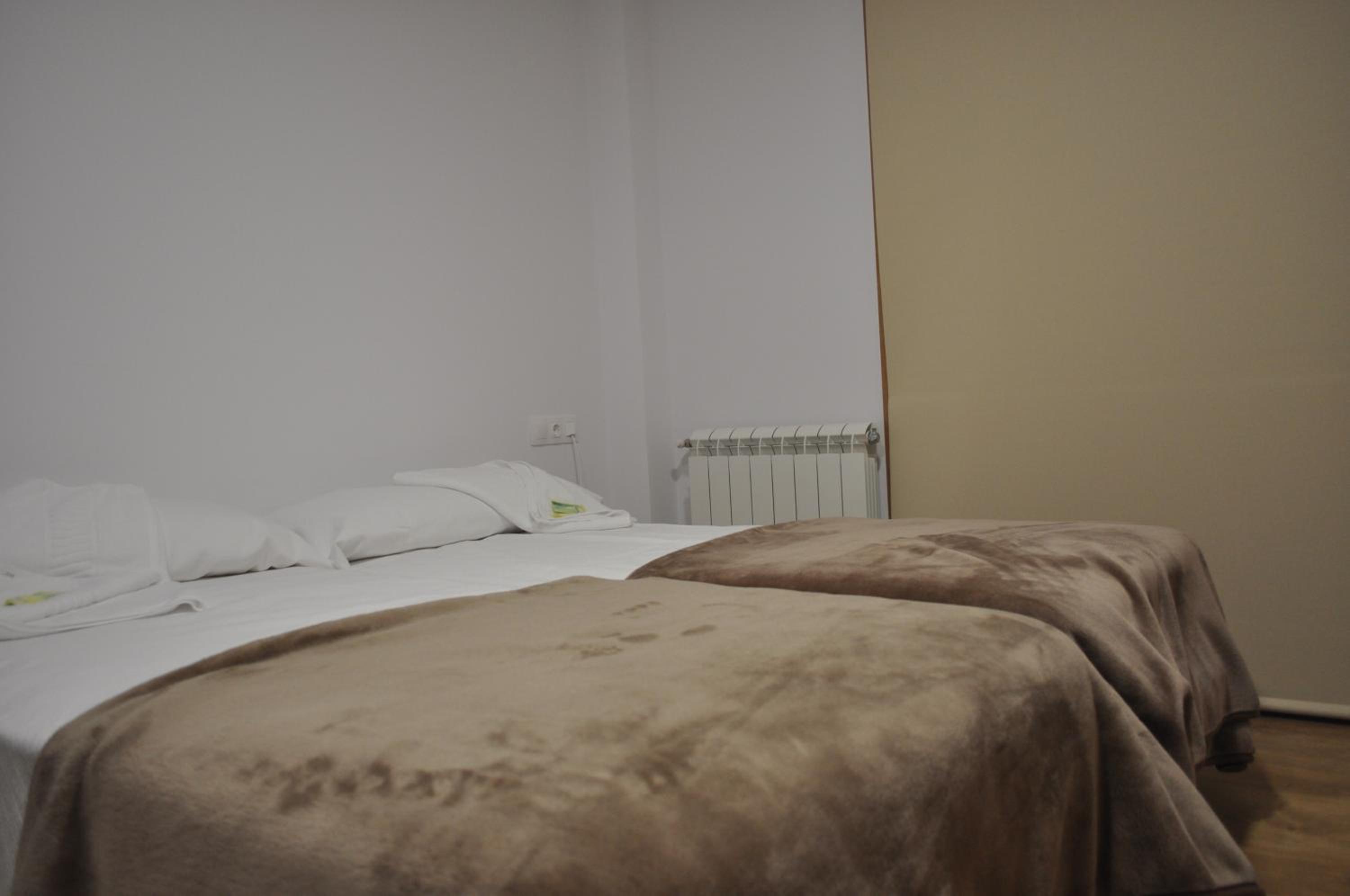 Habitación triple con baño