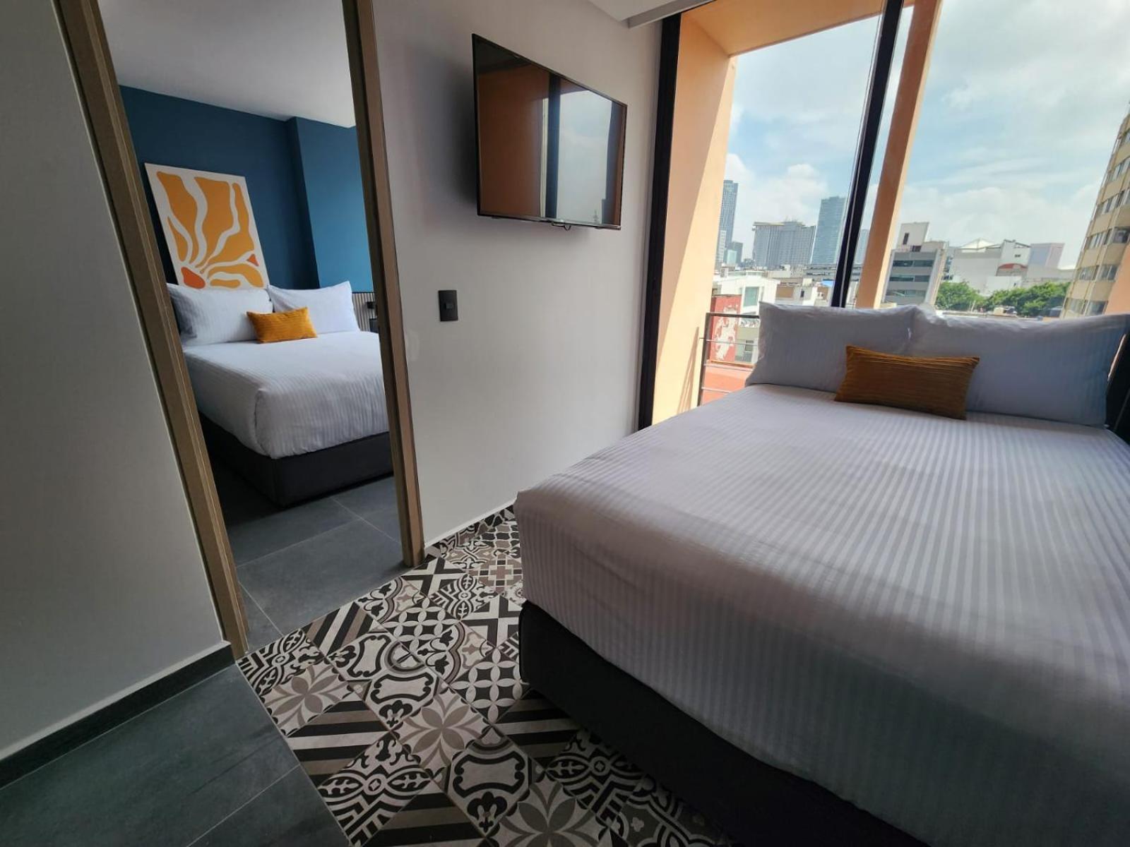 Two-Bedroom Deluxe Apartment with Balcony - Photo 2