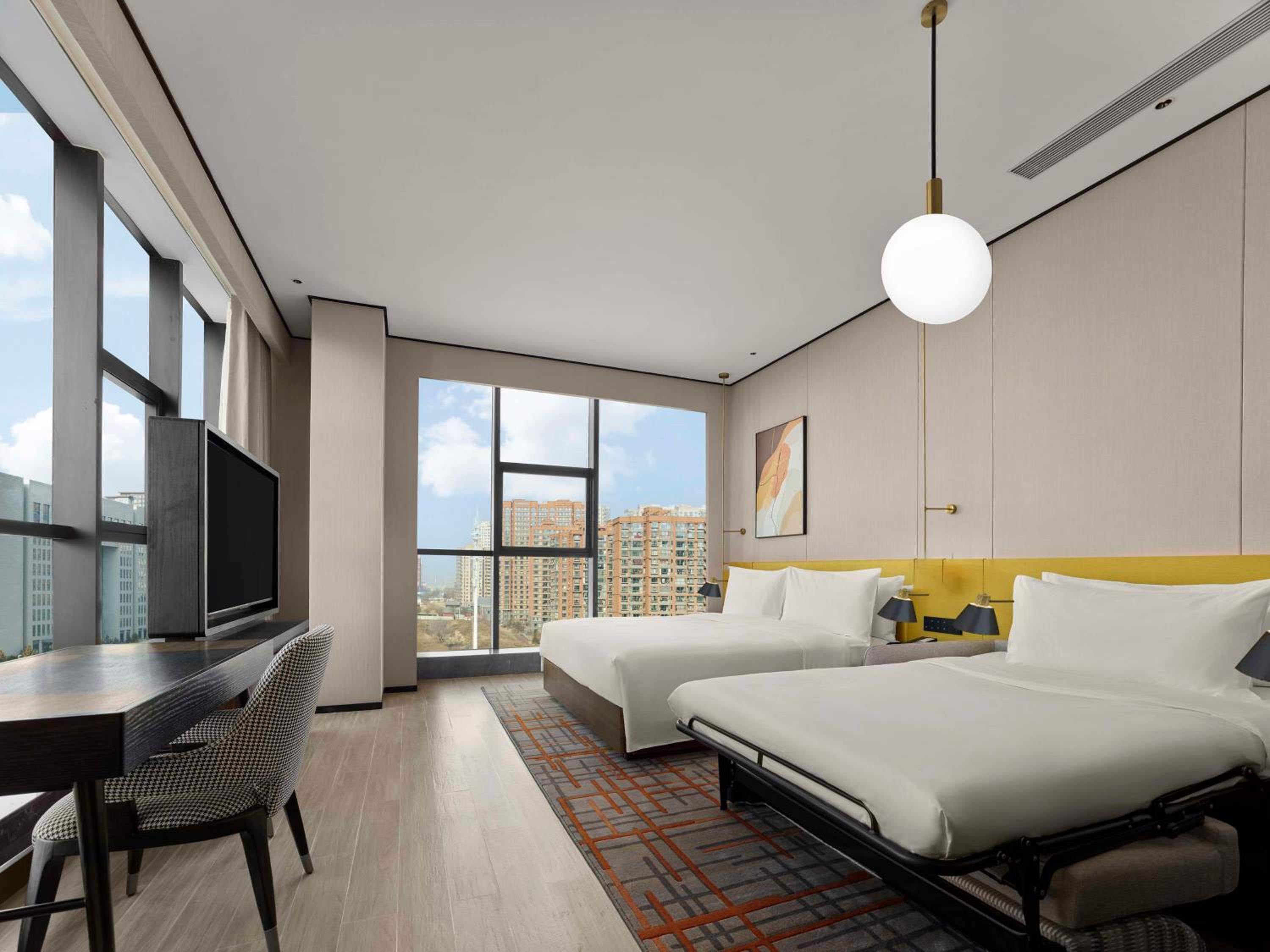 Deluxe King Room with Sofa Bed photo 3