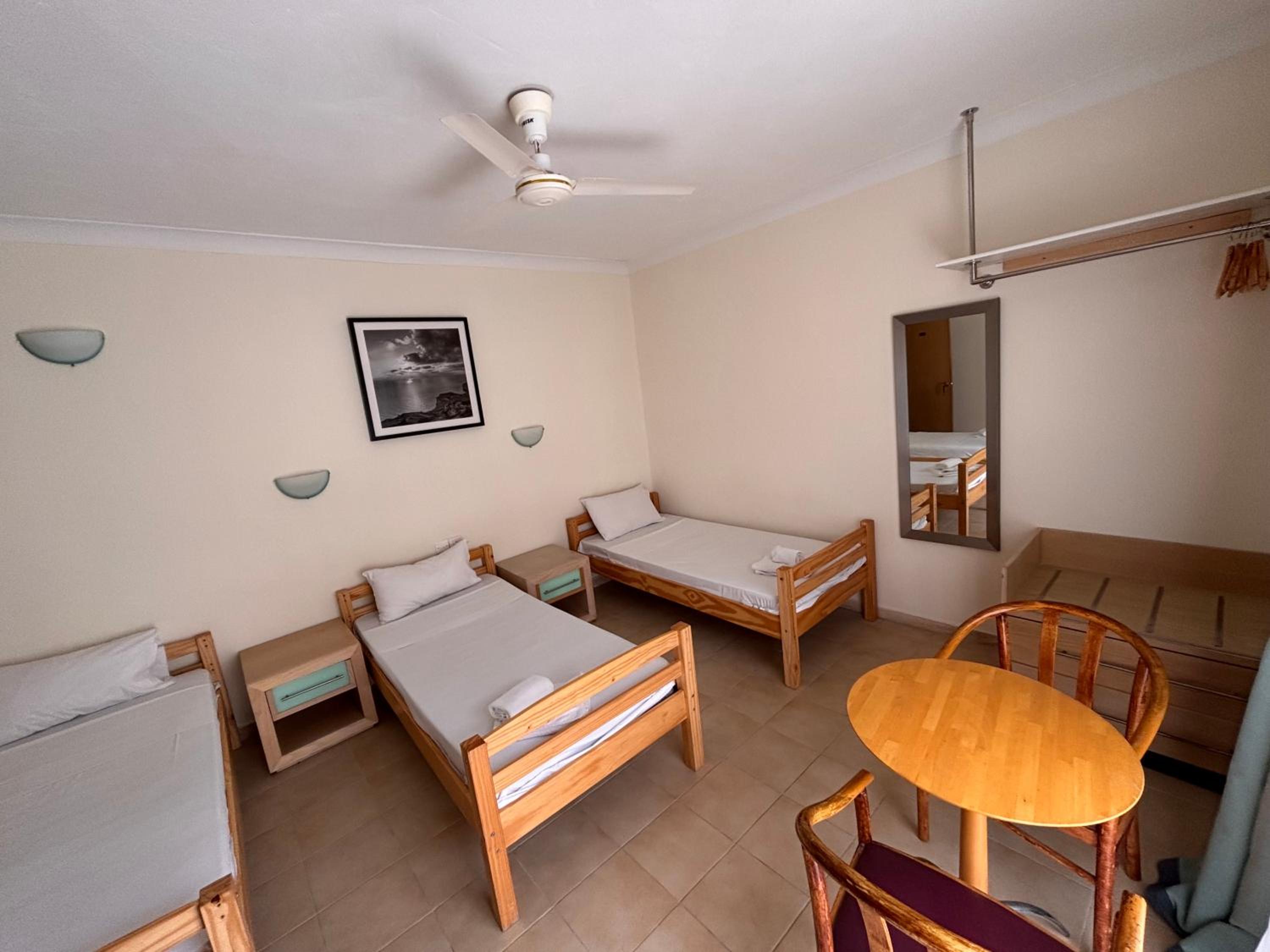 Triple Room with Balcony (3 Adults + 1 Child)