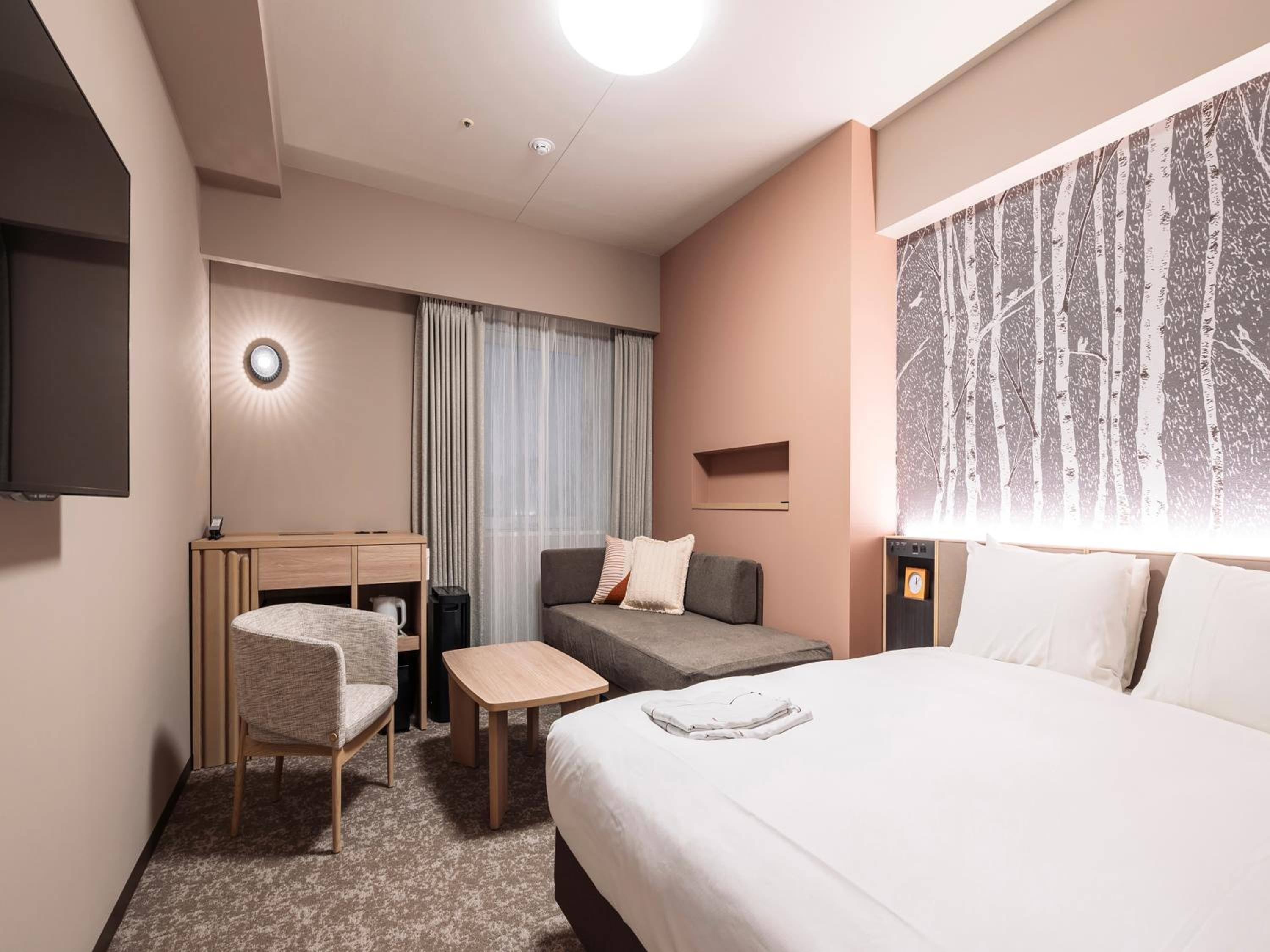 Deluxe Double Room-Triple Use - Smoking photo 2
