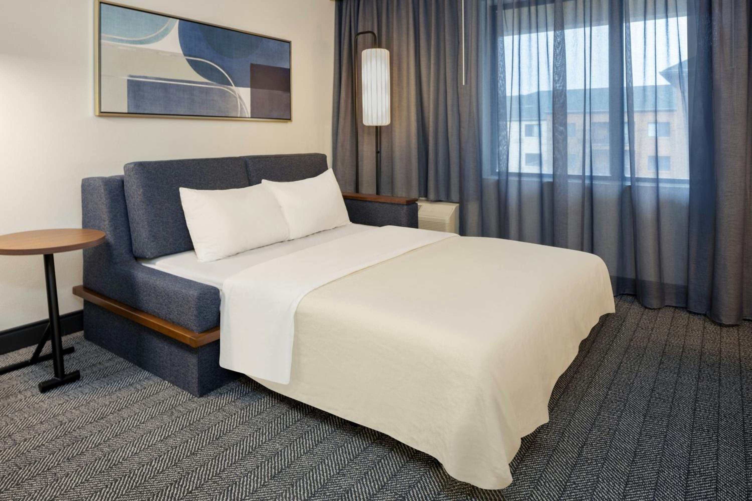 King Room with Sofa Bed - Hearing Accessible - Photo 14