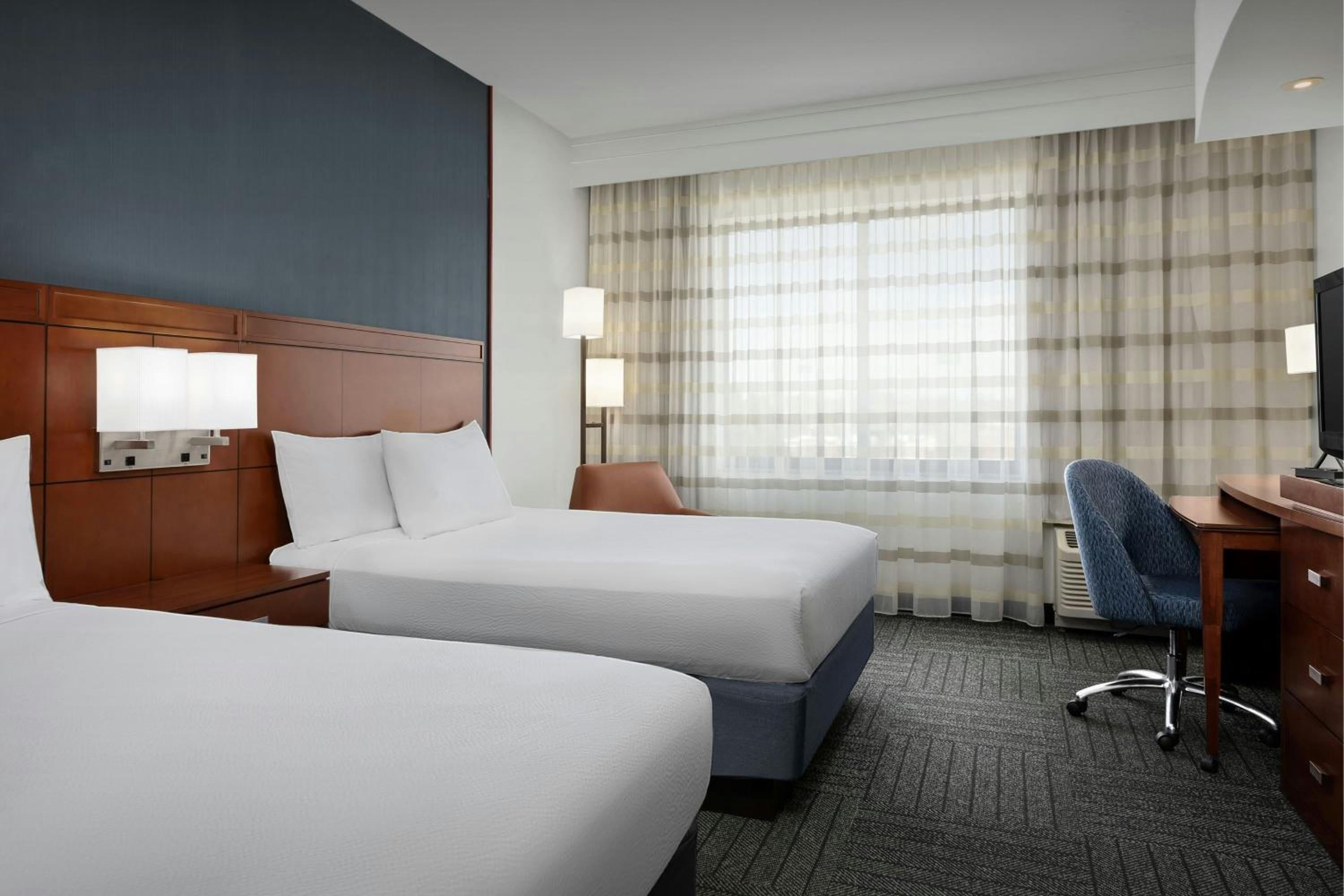 Queen Room with Two Queen Beds, Transfer Shower and Sofa Bed - Mobility Access/Hearing Accessible photo 1