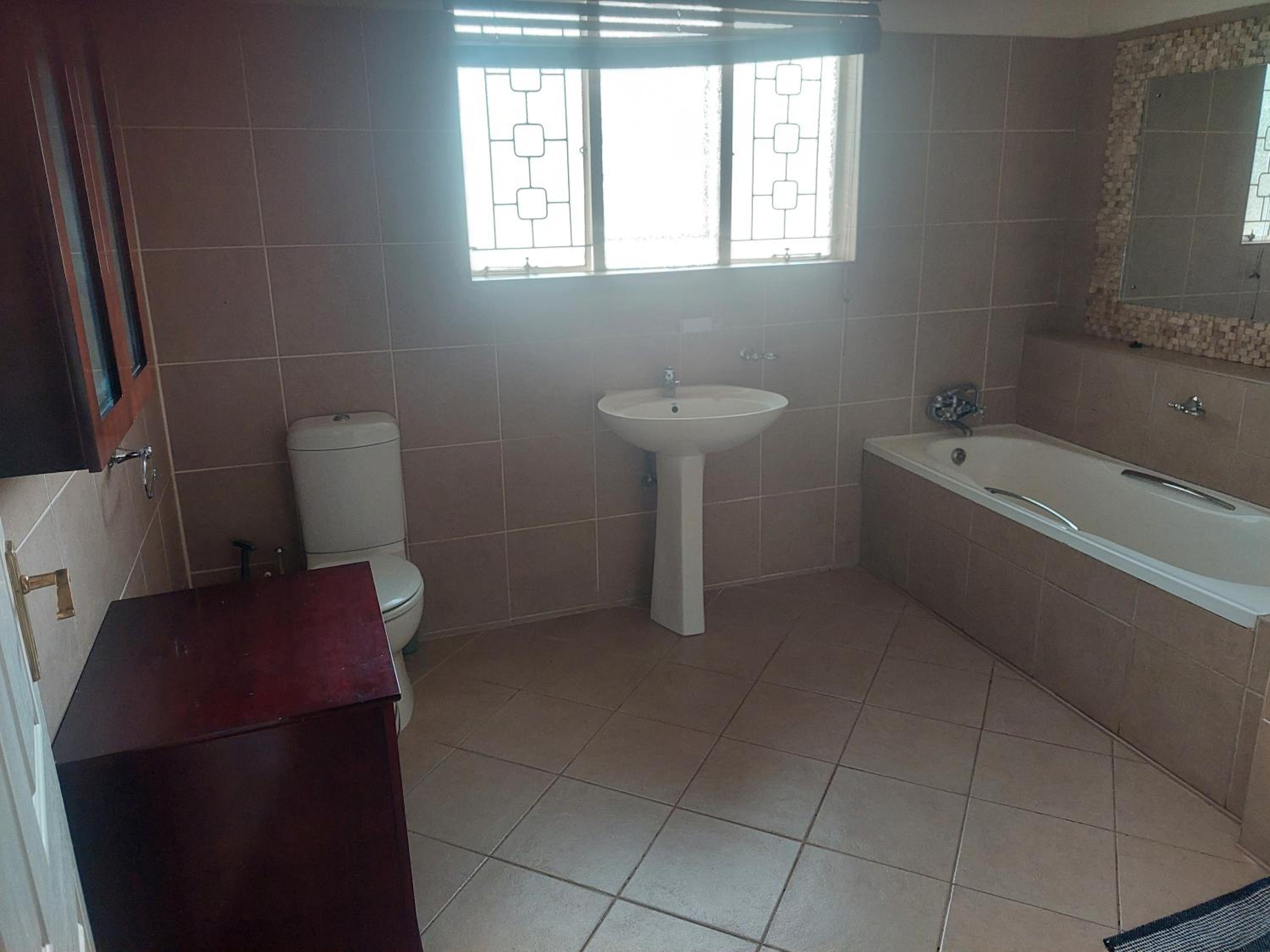 Three-Bedroom House - Photo 6