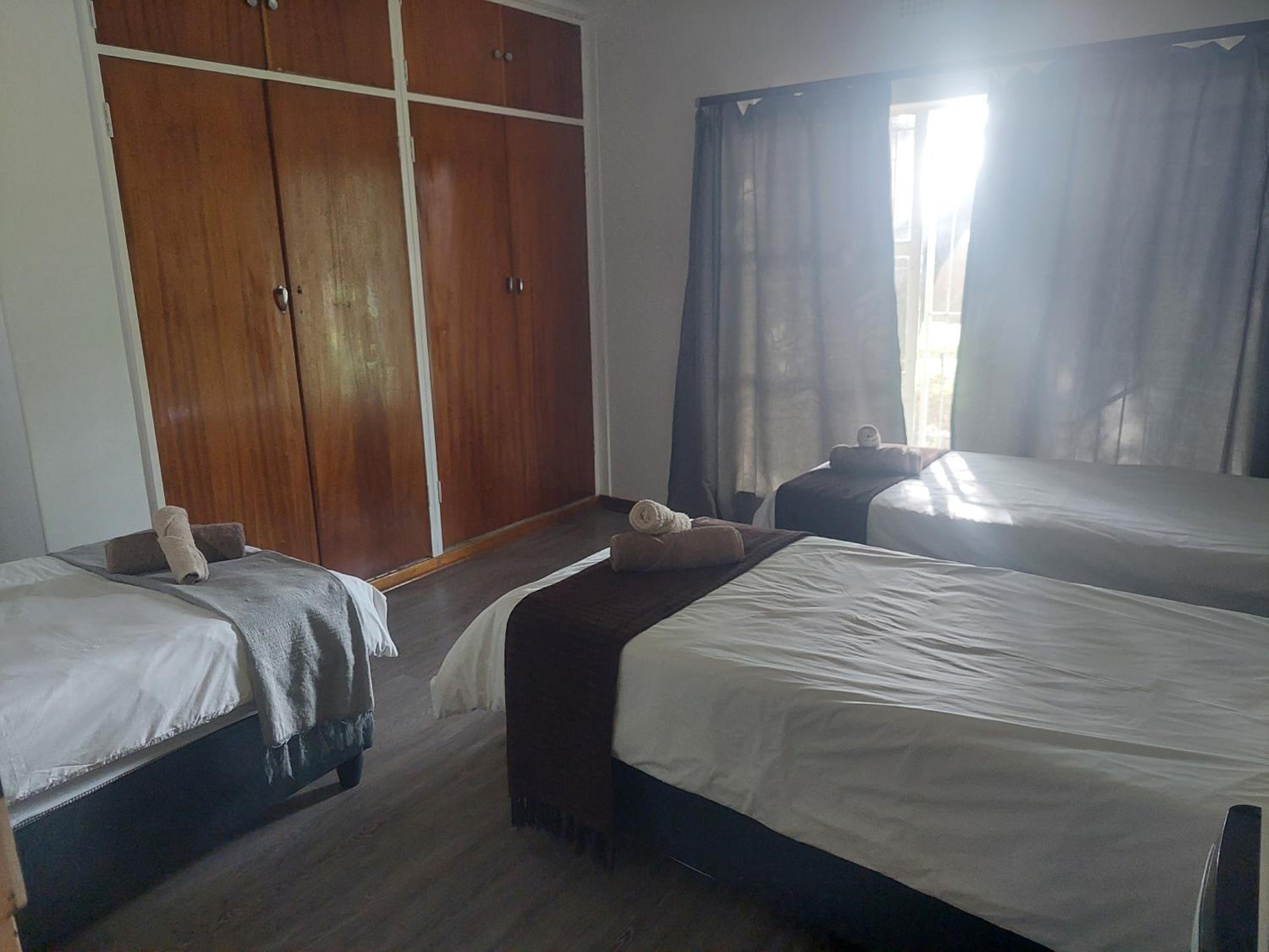 Three-Bedroom House - Photo 10