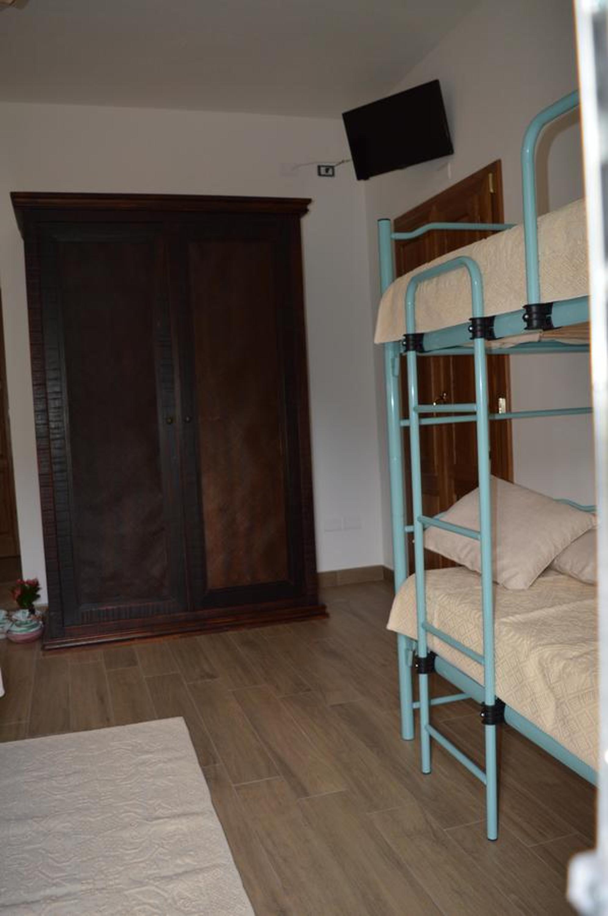 Quadruple Room with Balcony photo 2