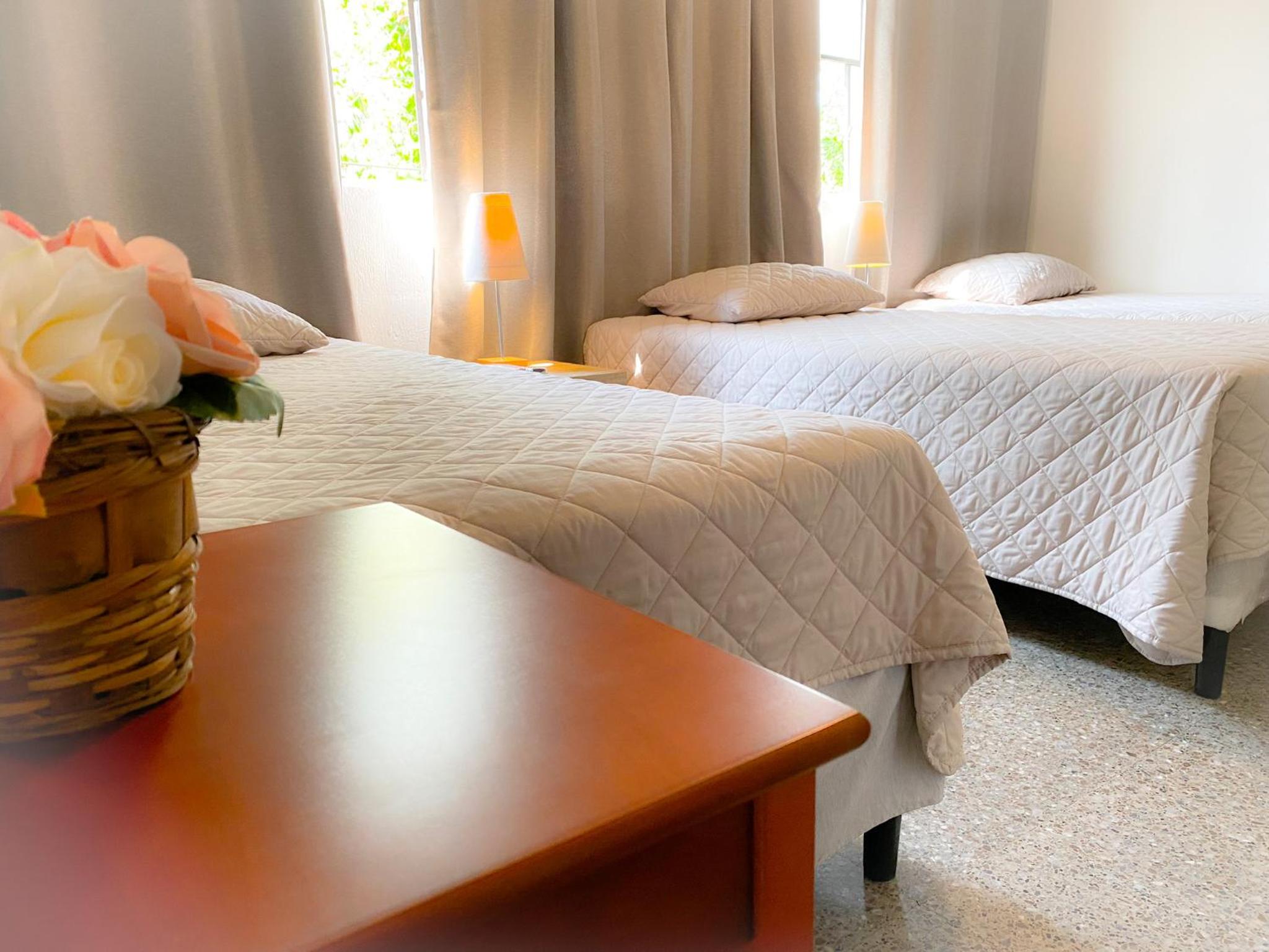 Economy Quadruple Room with Shared Bathroom