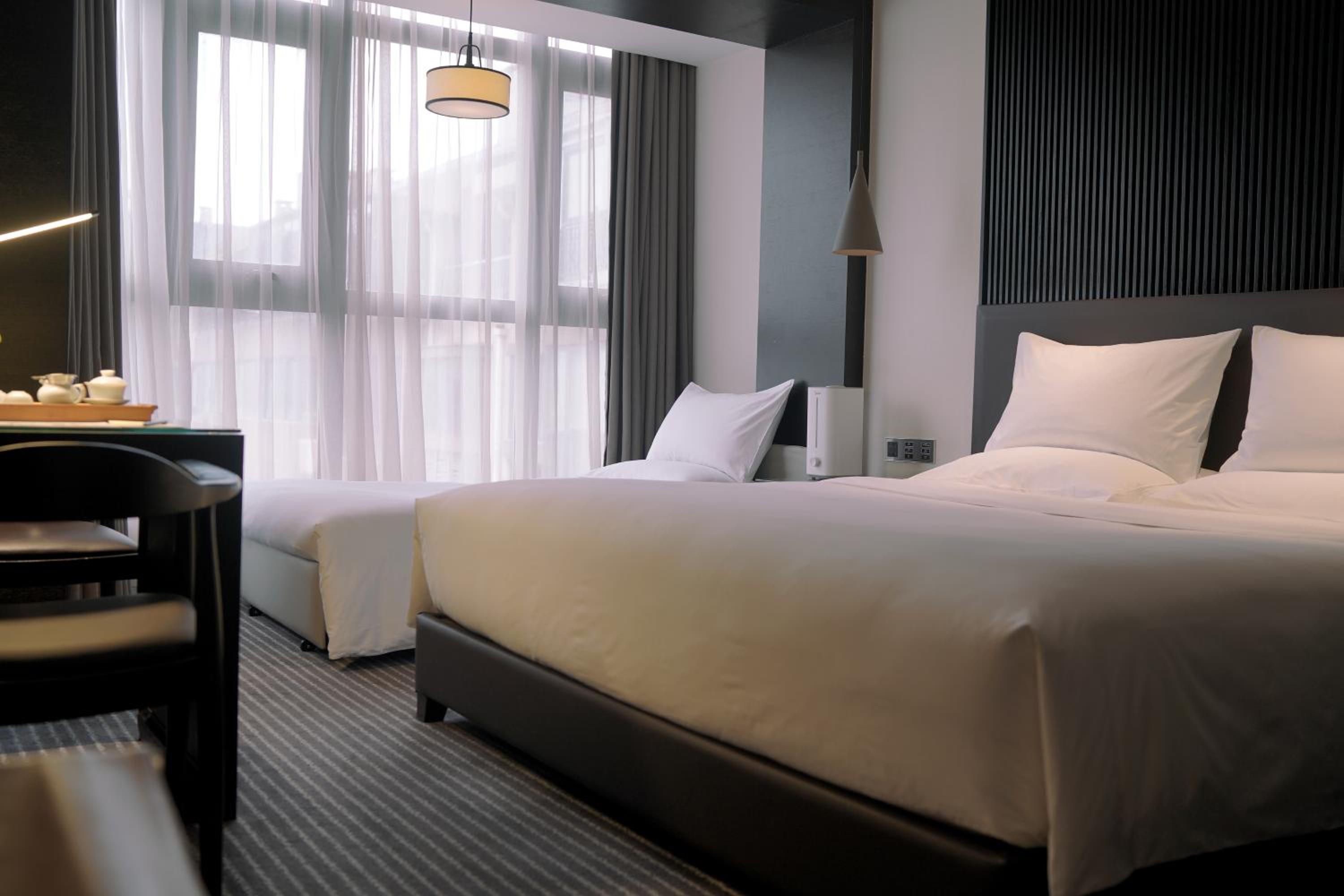  Deluxe Family Room with One King Bed and One Sofa Bed