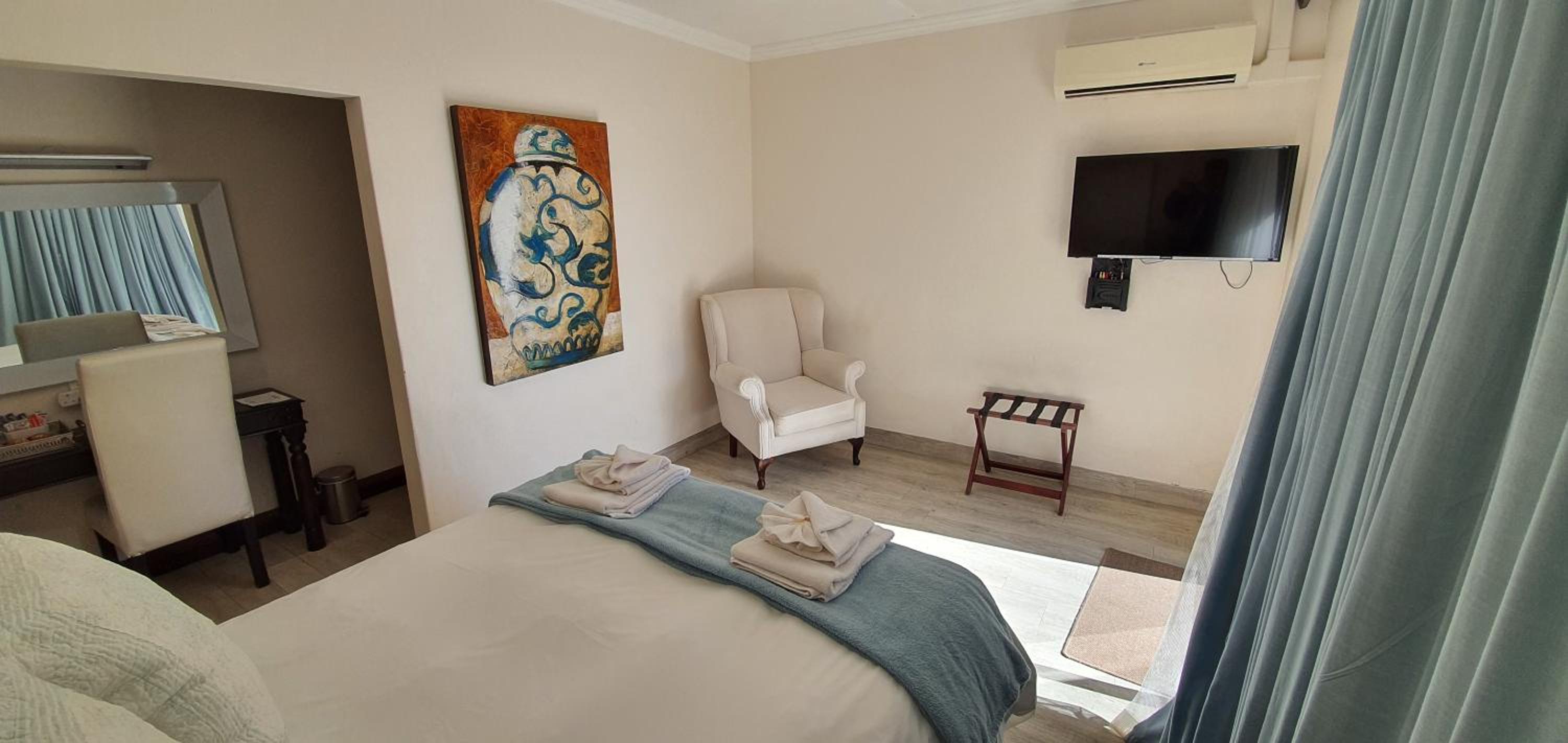 Deluxe Queen Room - Photo 1
