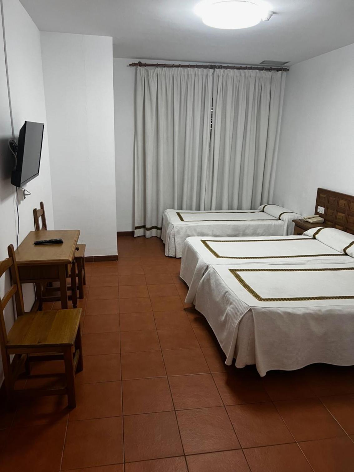 Economy Triple Room with Interior View