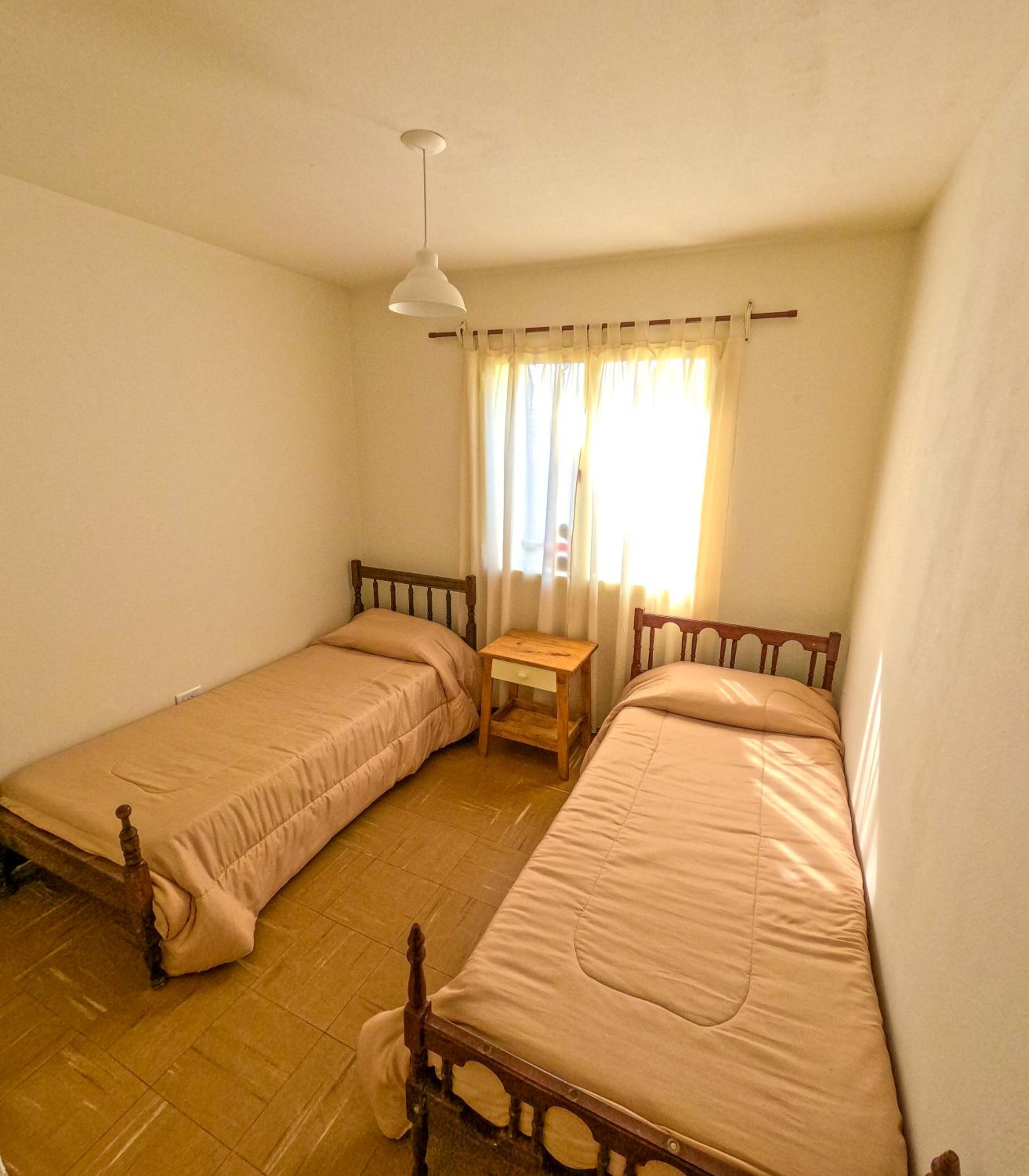 Single Bed in Dormitory Room